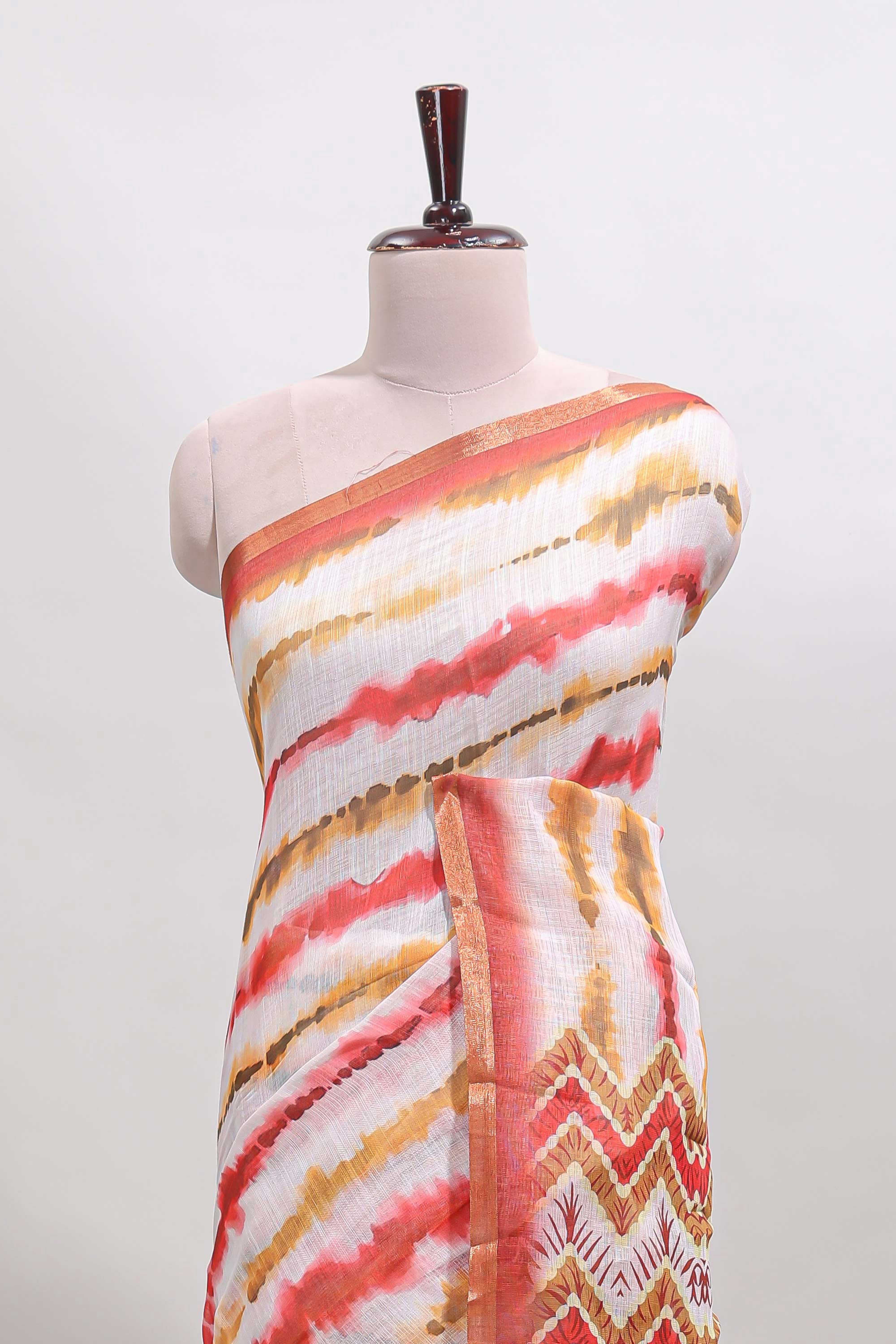 White tie & dye striped linen cotton saree with contrast zari border and printed blouse