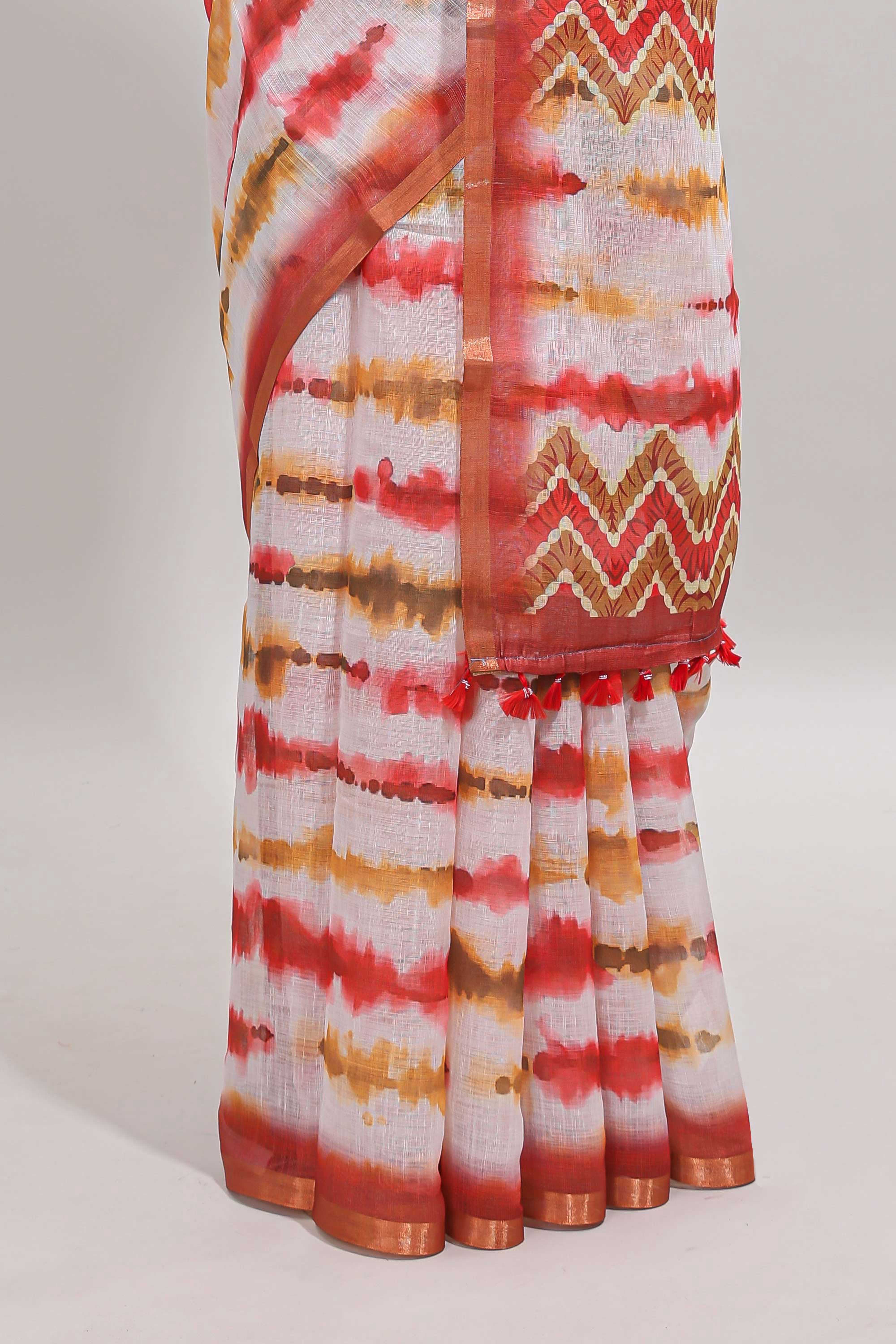White tie & dye striped linen cotton saree with contrast zari border and printed blouse