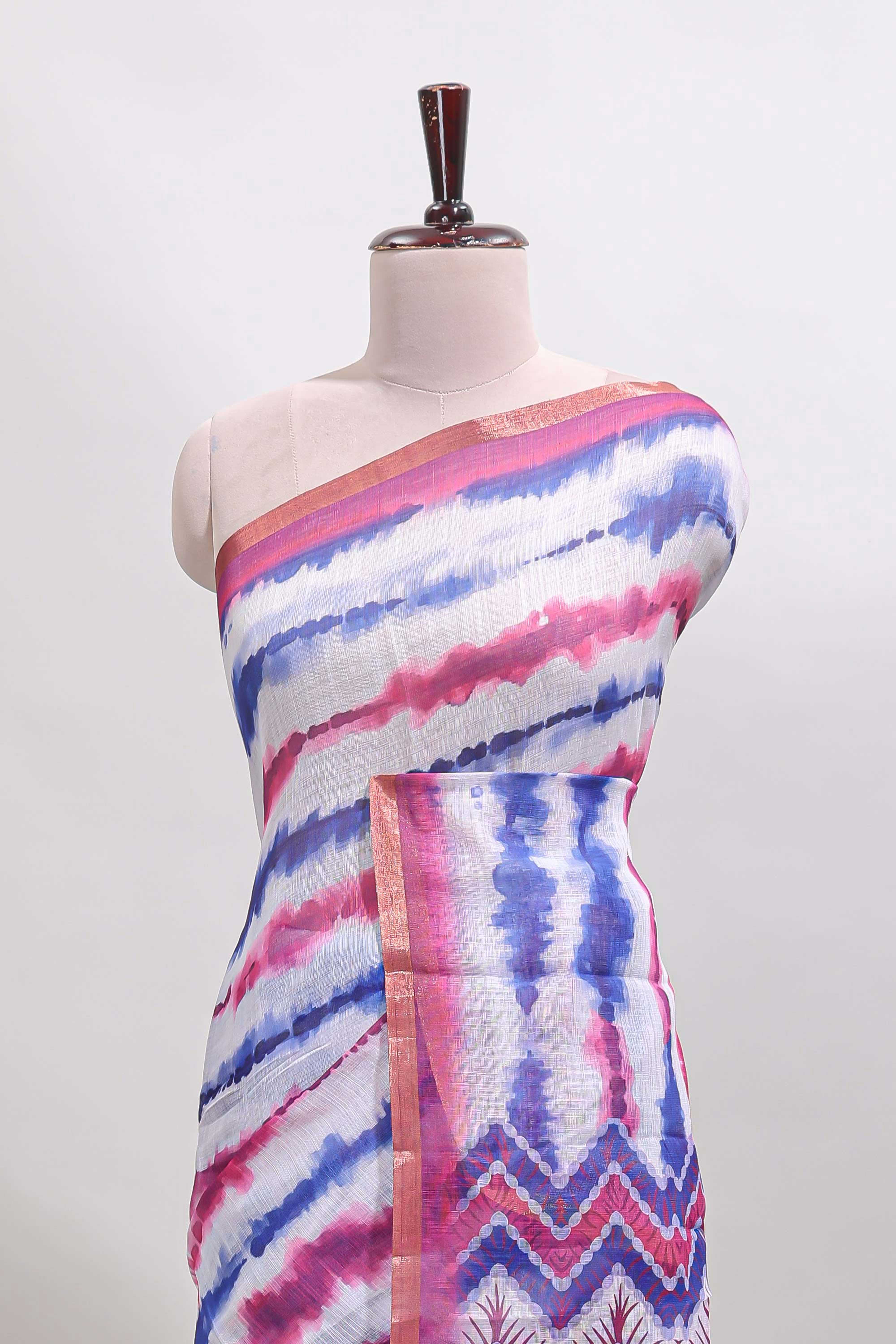 White tie & dye striped linen cotton saree with contrast zari border and printed blouse