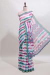 White tie & dye striped linen cotton saree with contrast zari border and printed blouse