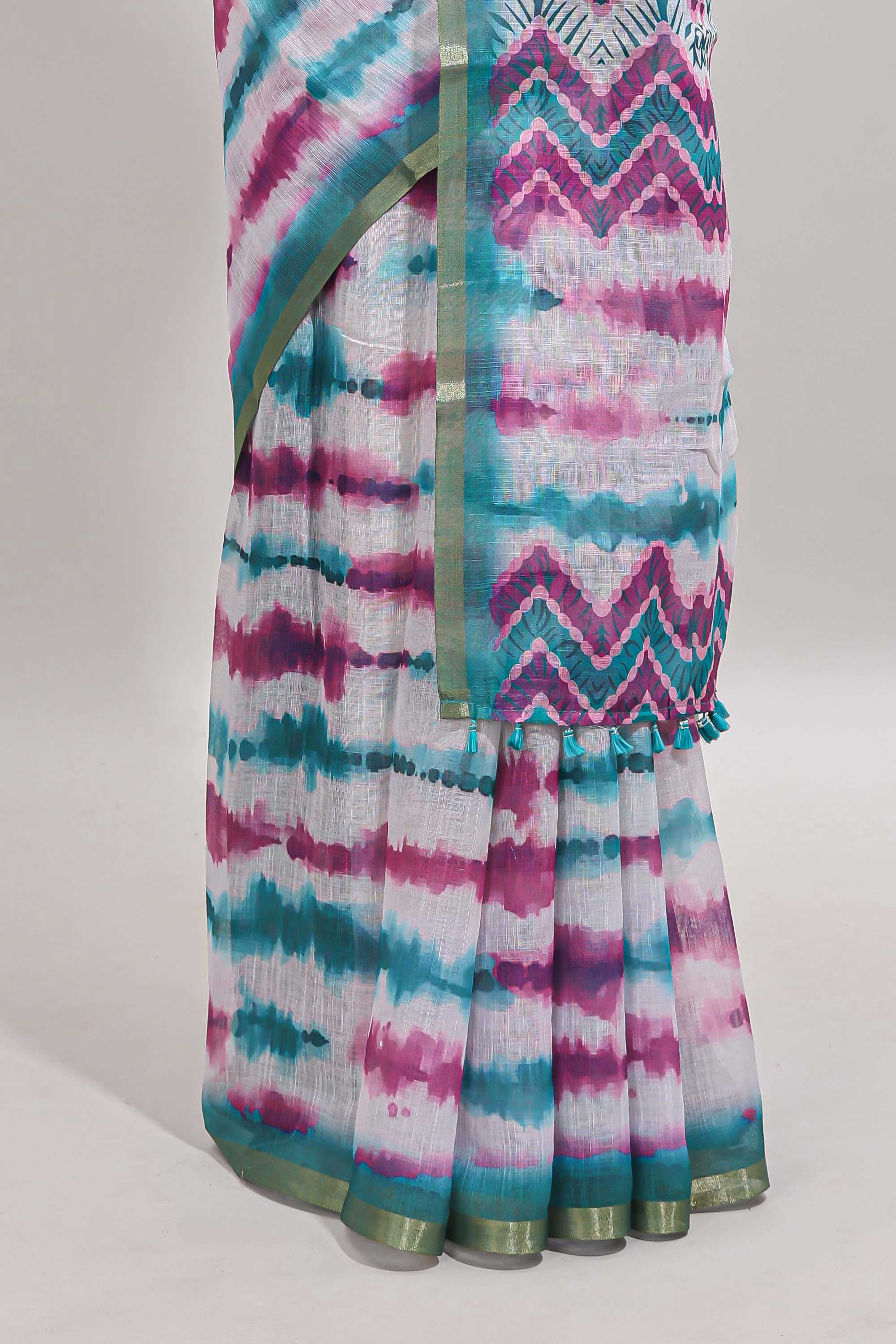 White tie & dye striped linen cotton saree with contrast zari border and printed blouse