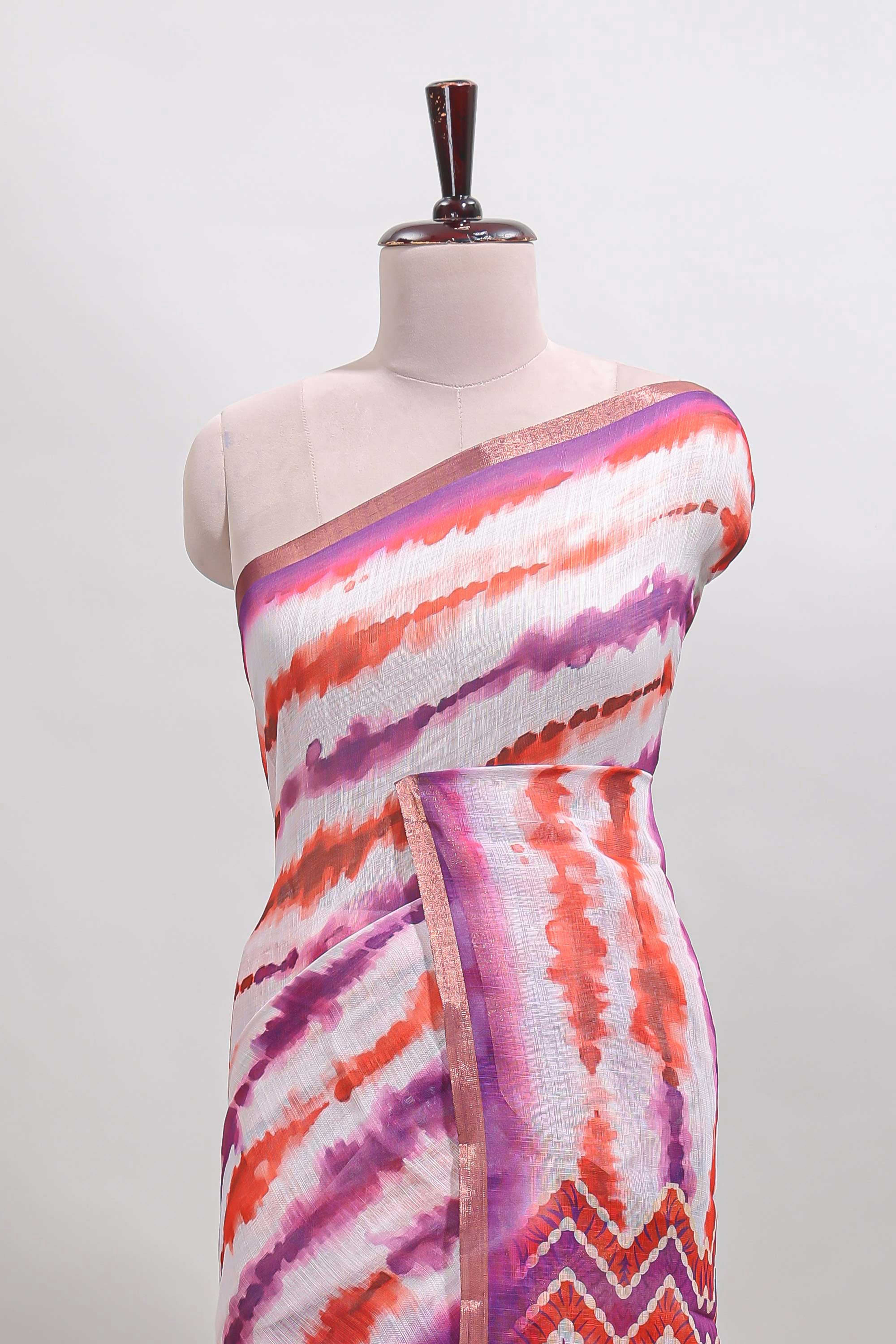 White tie & dye striped linen cotton saree with contrast zari border and printed blouse