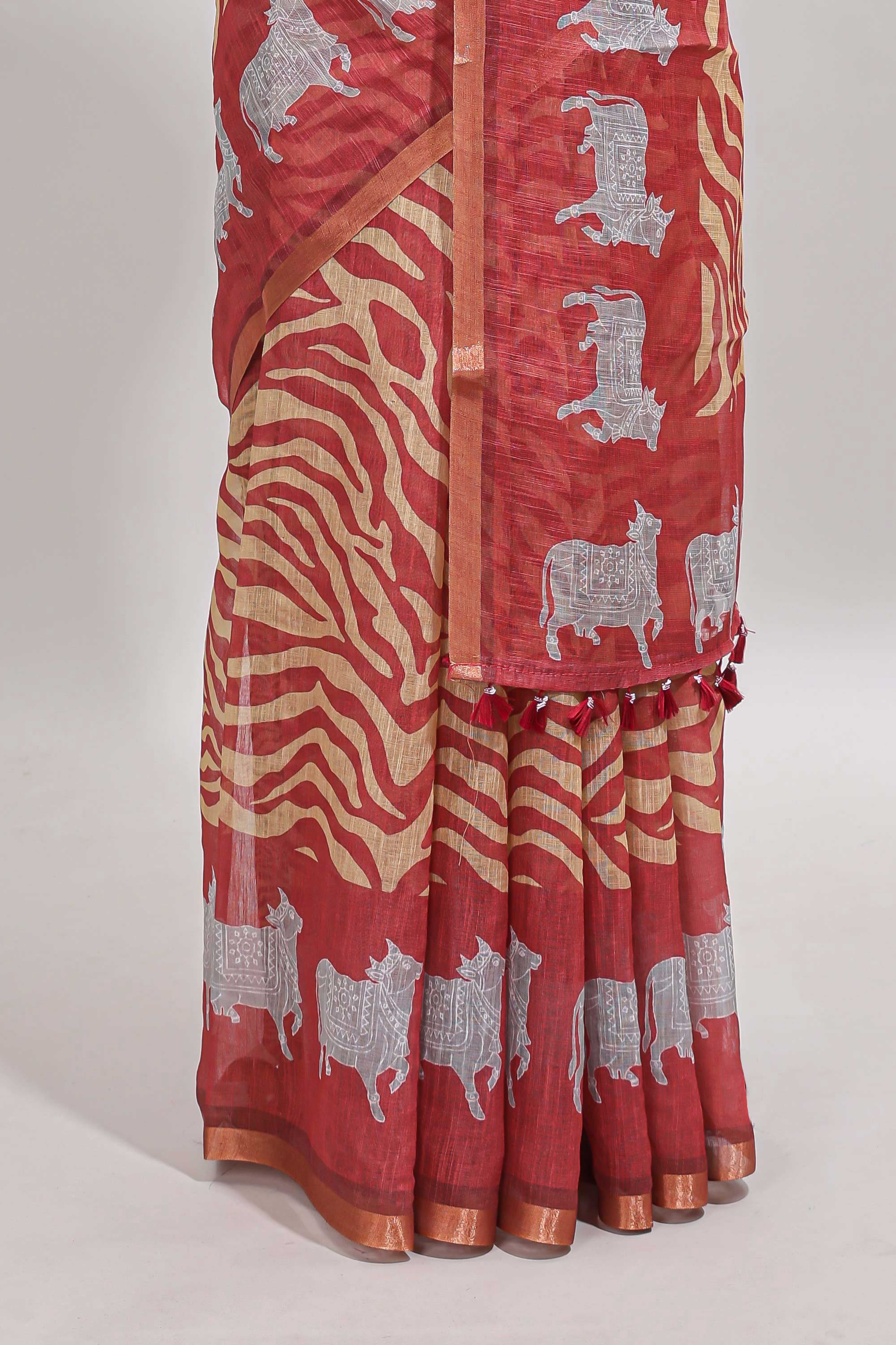 Peach pichwai cow prints & Zebra inspired pattern linen cotton saree with self zari border and matching blouse