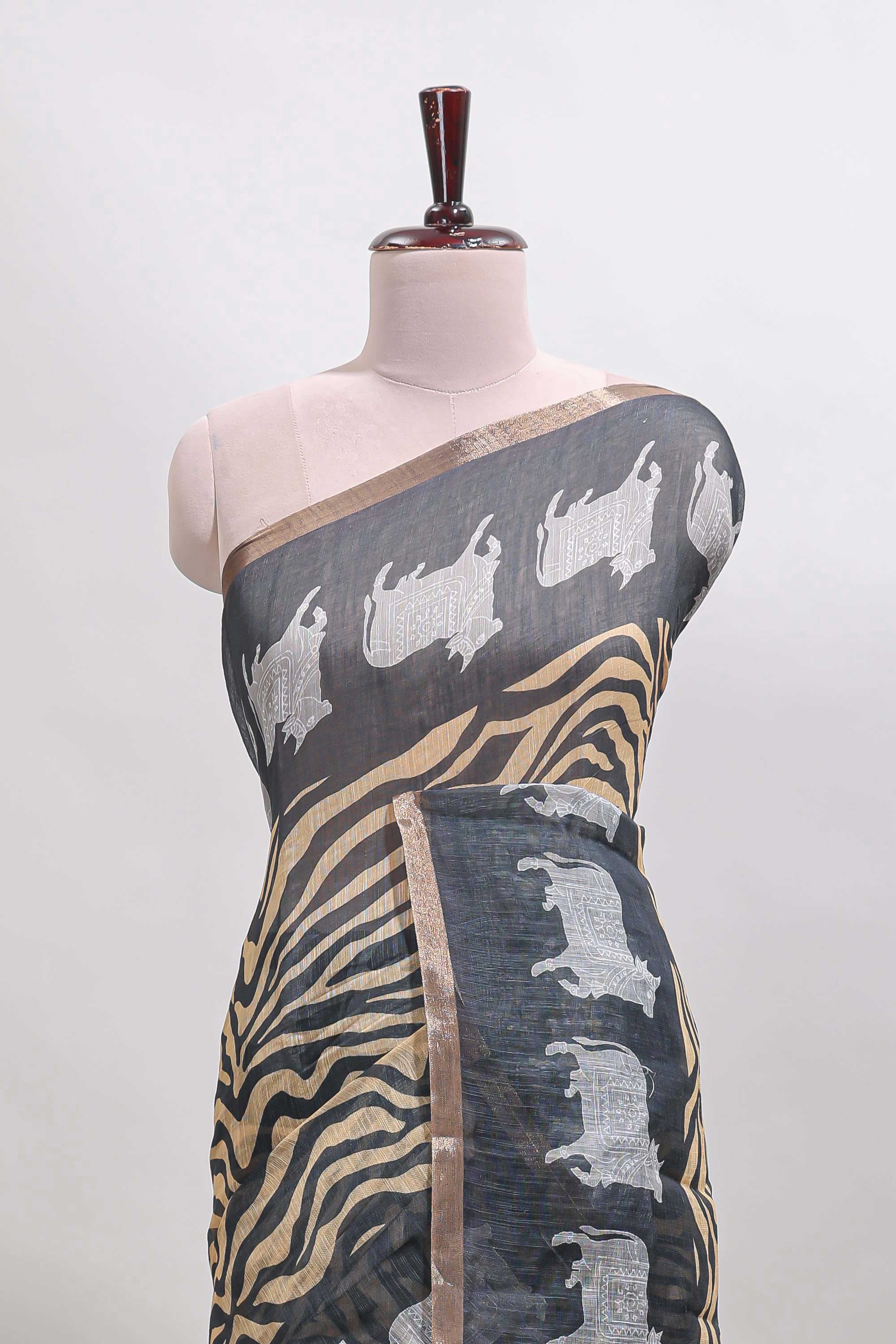 Grey pichwai cow prints & Zebra inspired pattern linen cotton saree with self zari border and matching blouse