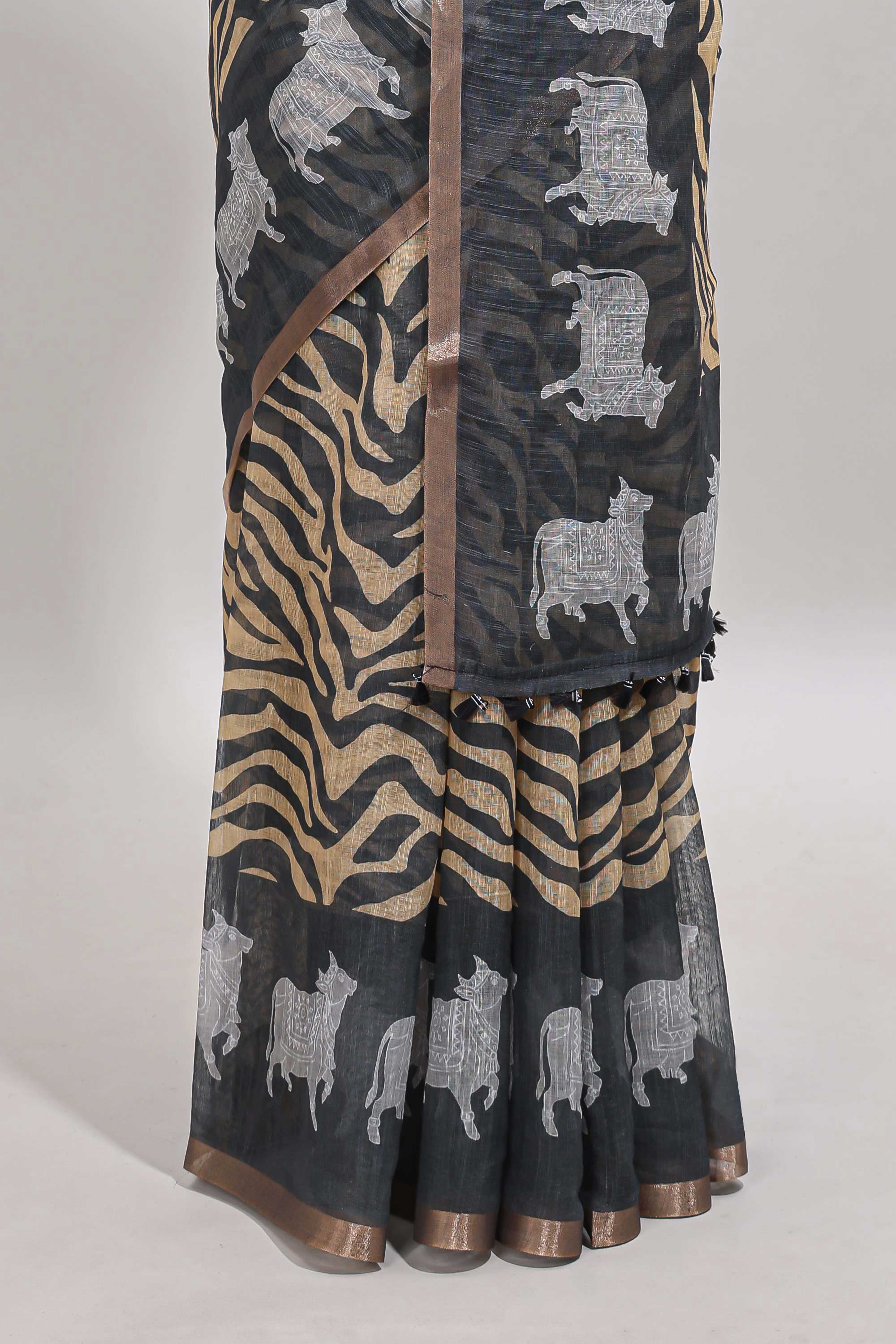 Grey pichwai cow prints & Zebra inspired pattern linen cotton saree with self zari border and matching blouse