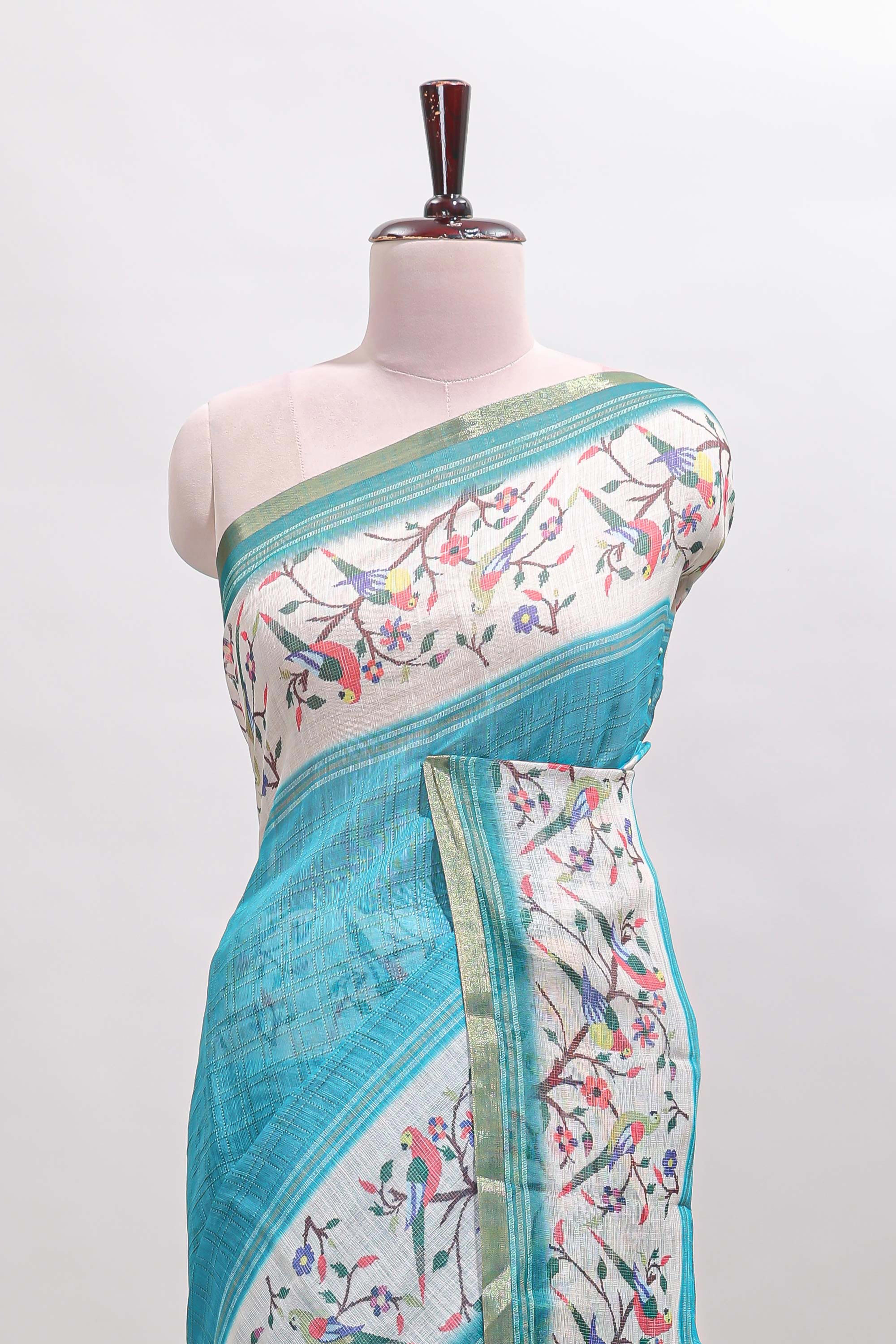 Turquoise green floral & bird motif bottom with checked body linen cotton saree, self zari border and matching blouse