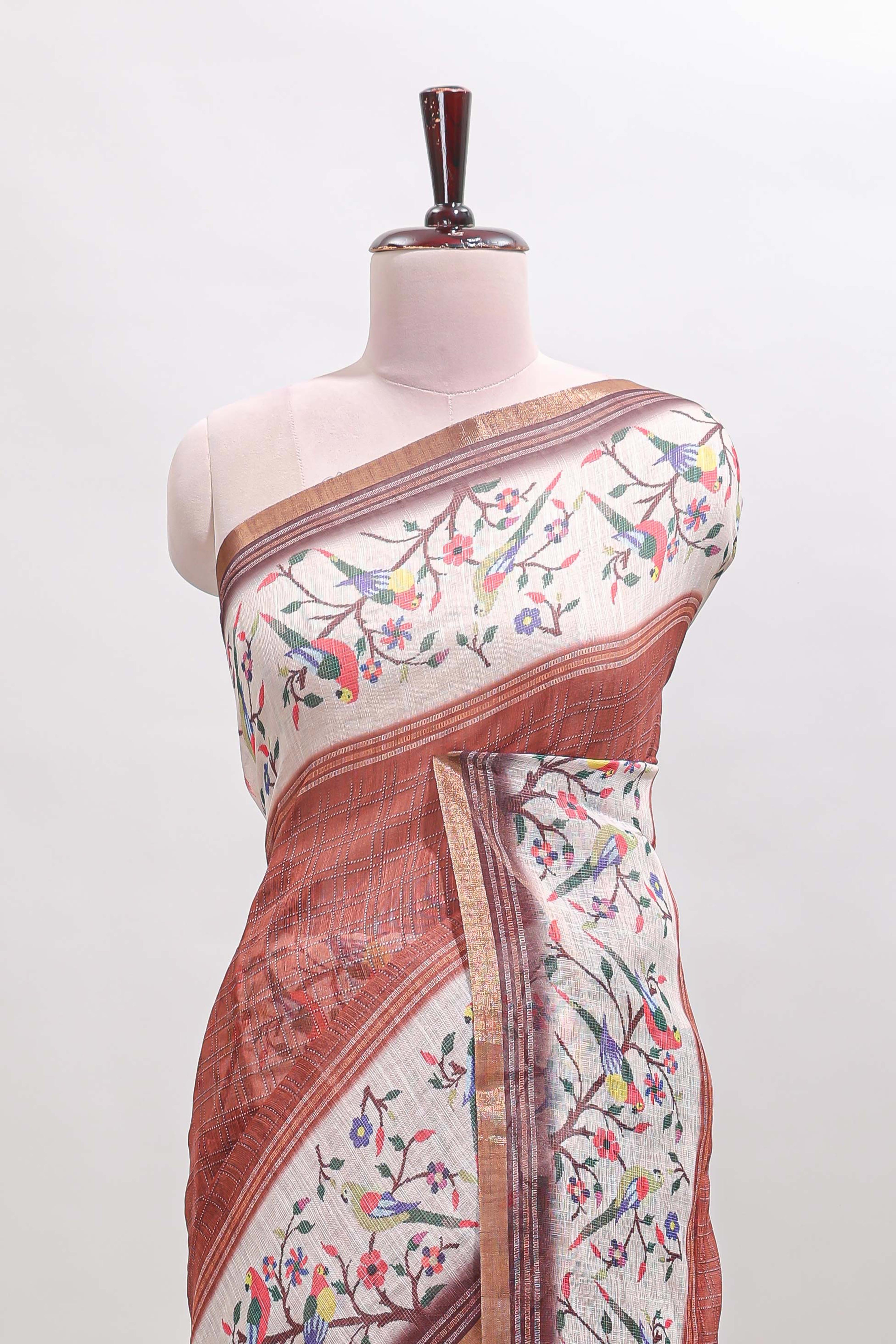 Brown floral & bird motif bottom with checked body linen cotton saree, self zari border and matching blouse