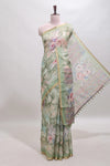 Green floral design linen cotton saree with self zari border and matching blouse