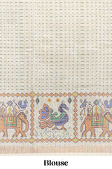 Green checked geometric motifs linen cotton saree with contrast ikkat style border and blouse
