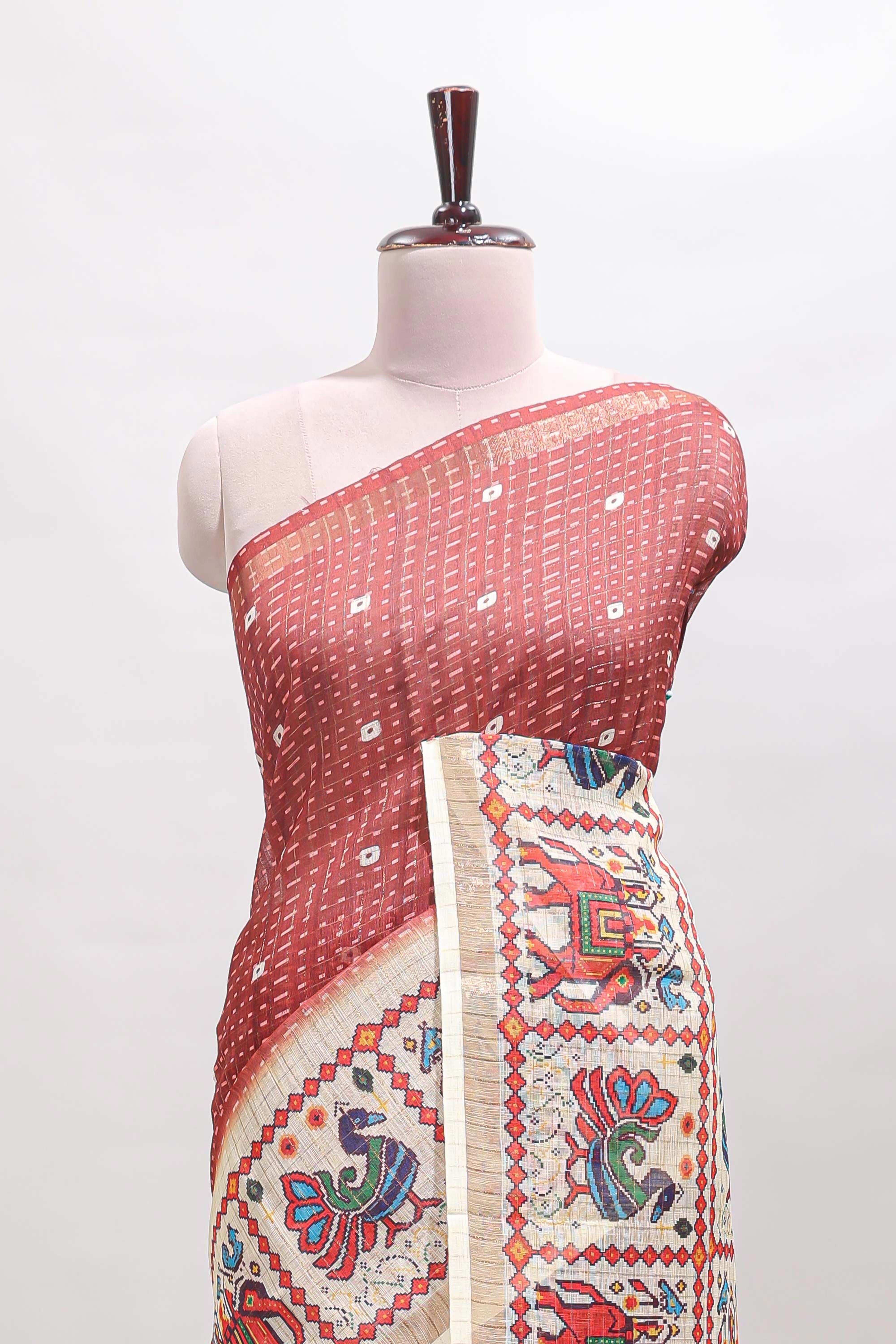 Maroon checked geometric motifs linen cotton saree with contrast ikkat style border and blouse
