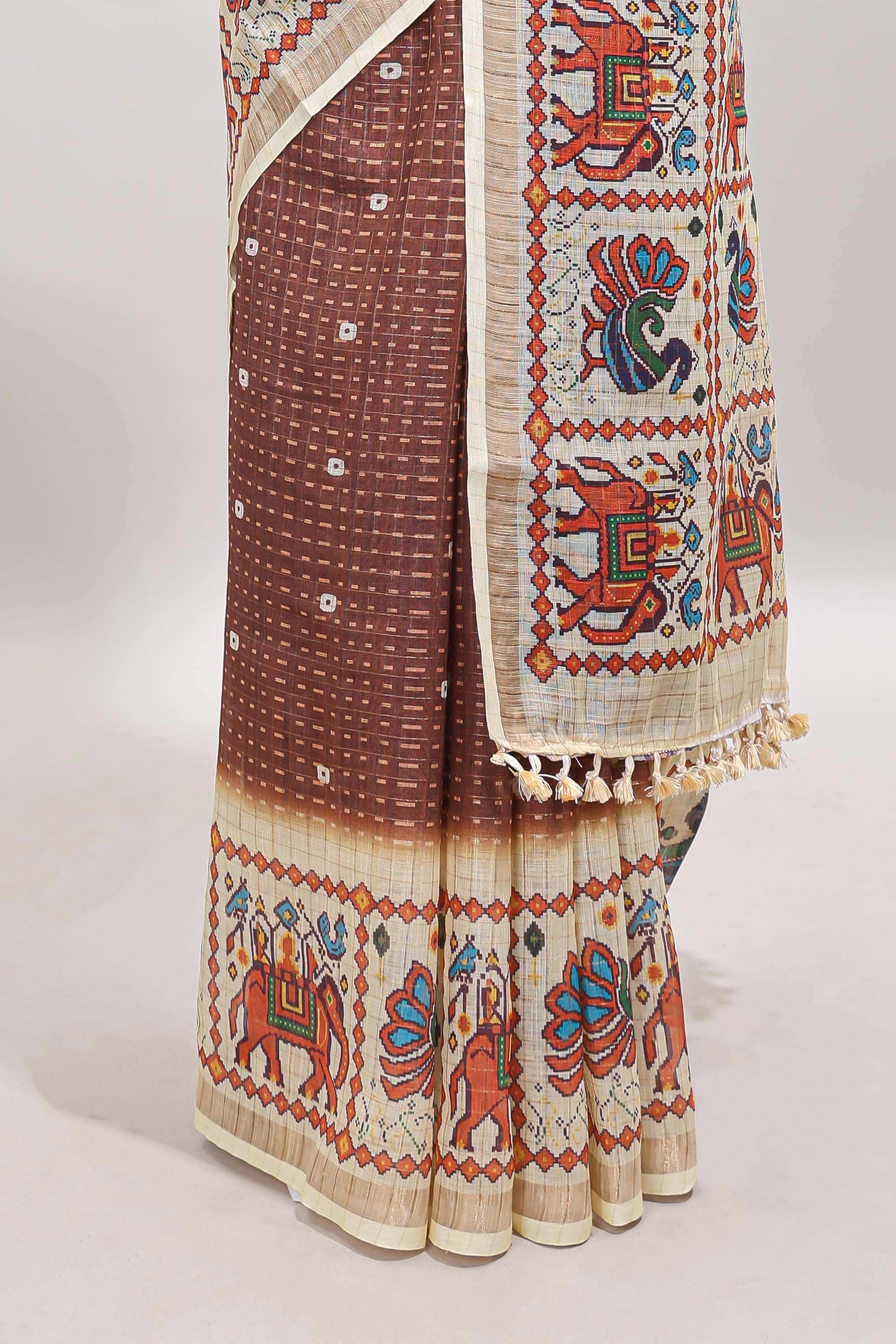 Brown checked geometric motifs linen cotton saree with contrast ikkat style border and blouse