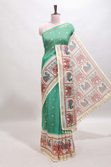 Green checked geometric motifs linen cotton saree with contrast ikkat style border and blouse