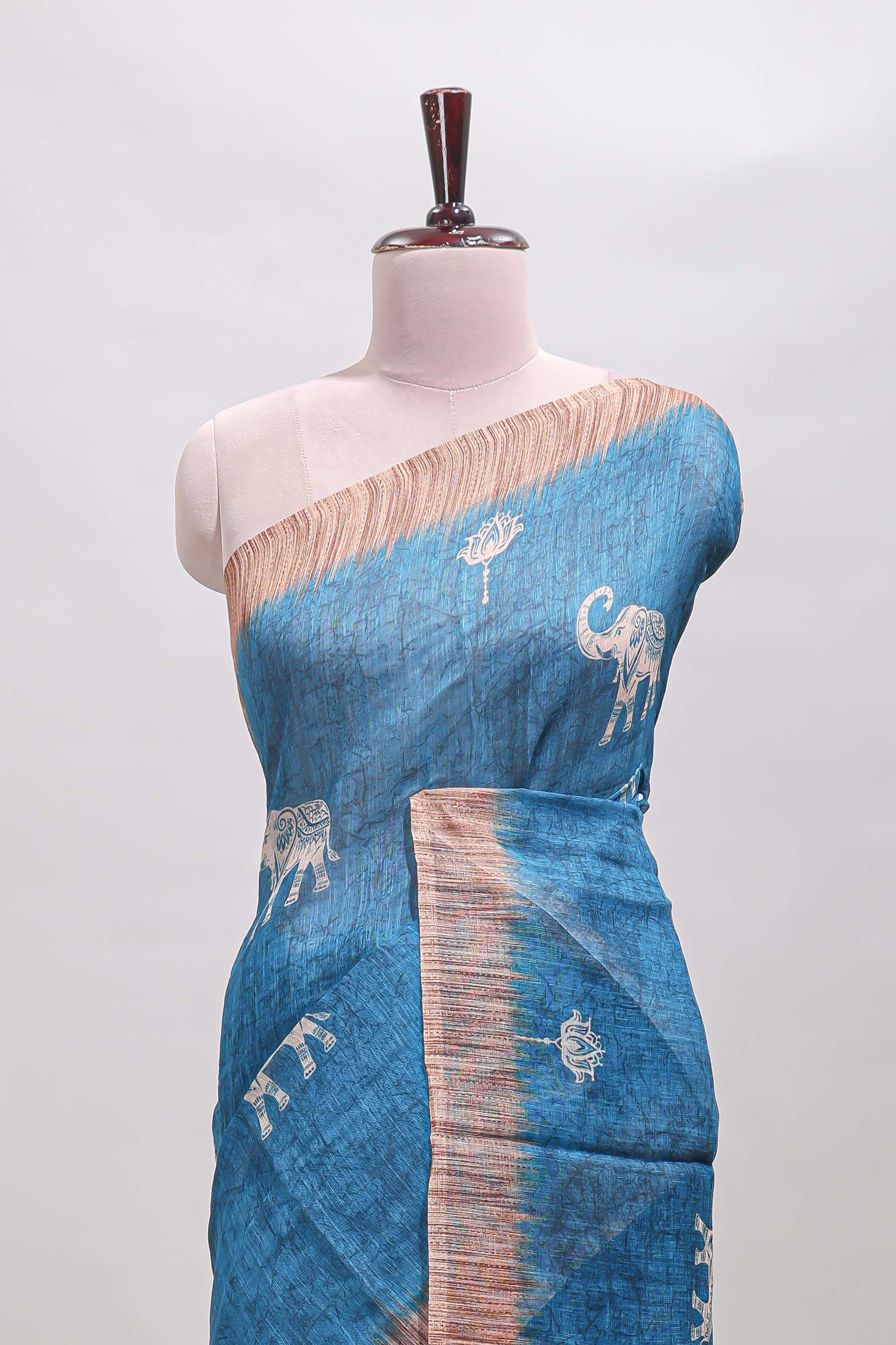 Blue floral & elephant motifs linen cotton with contrast border and matching blouse