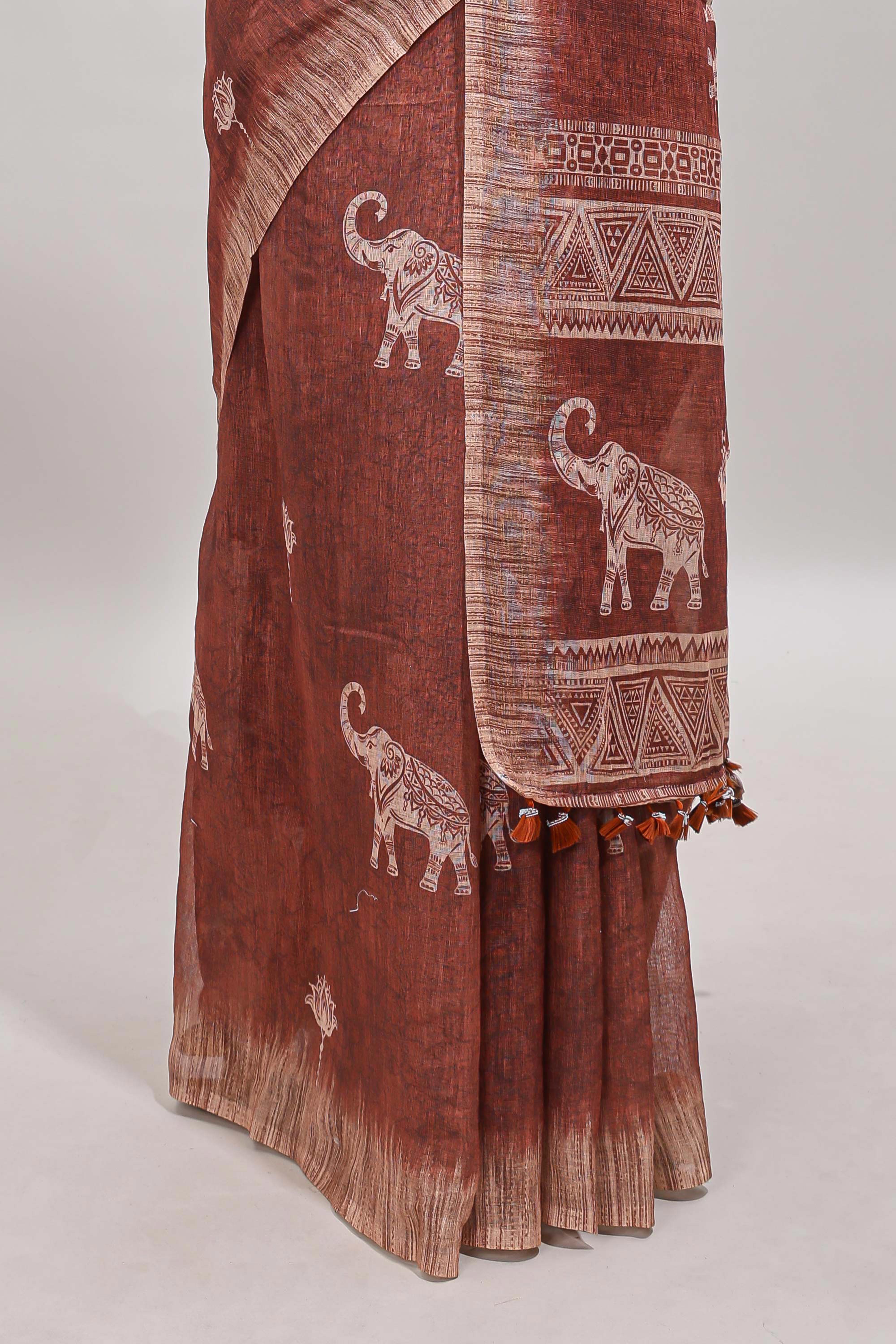 Brown floral & elephant motifs linen cotton with contrast border and matching blouse