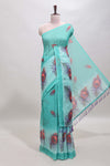 Green peacock feather motifs linen cotton saree with self border and matching blouse
