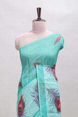 Green peacock feather motifs linen cotton saree with self border and matching blouse
