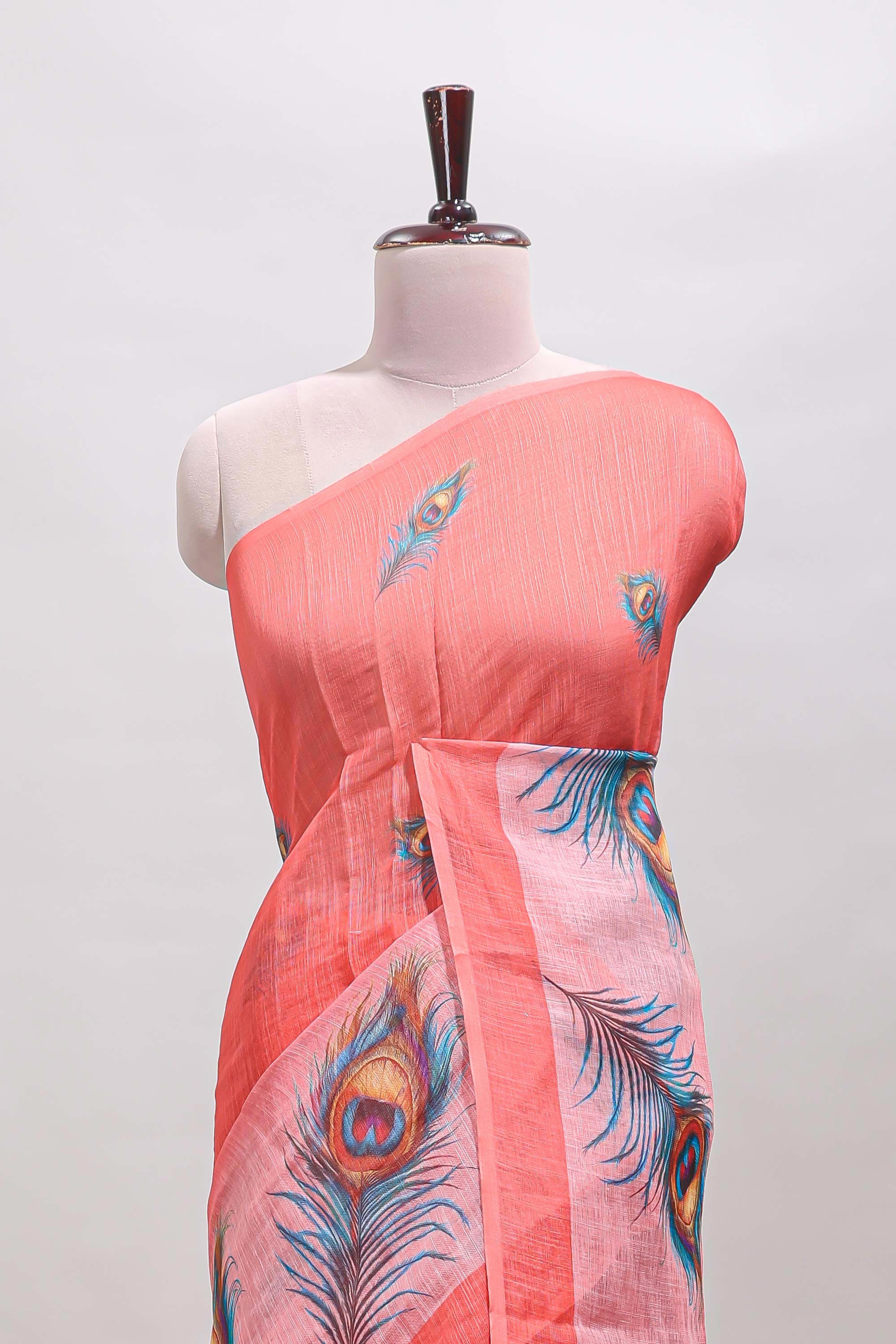 Orange peacock feather motifs linen cotton saree with self border and matching blouse