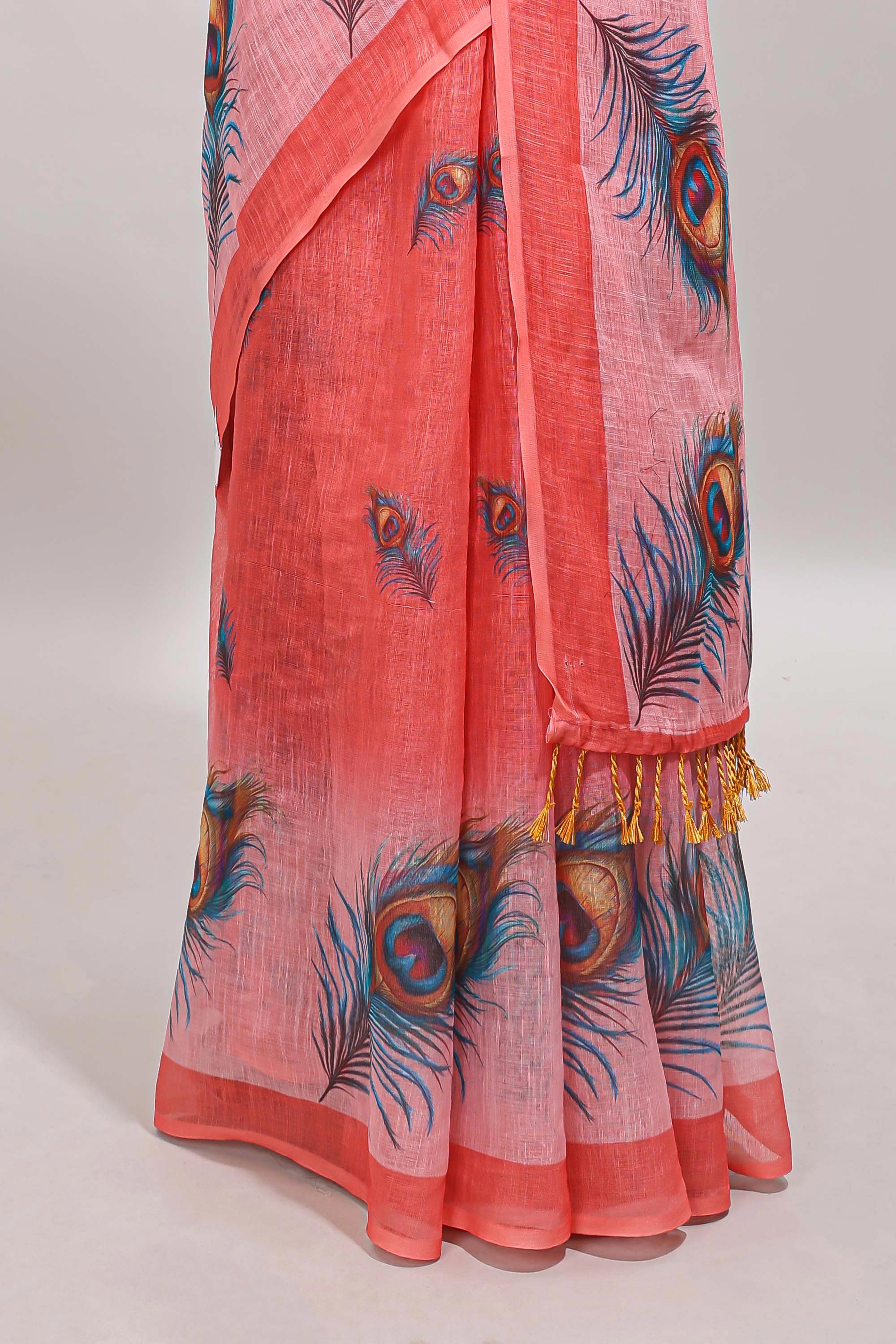 Orange peacock feather motifs linen cotton saree with self border and matching blouse