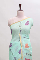 Pista green floral design linen cotton saree with self zari border and contrast blouse