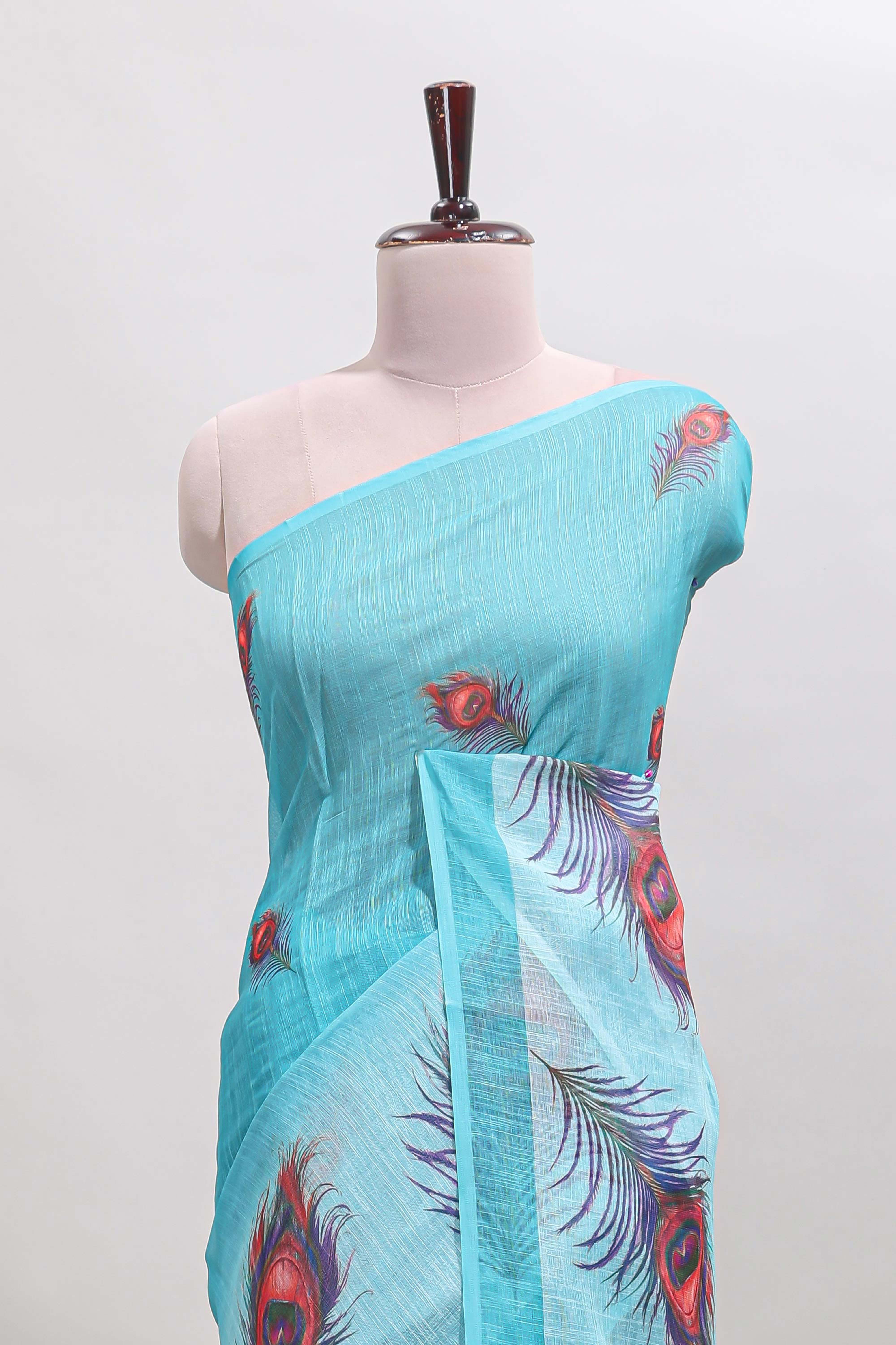 Sky blue floral design linen cotton saree with self zari border and matching blouse