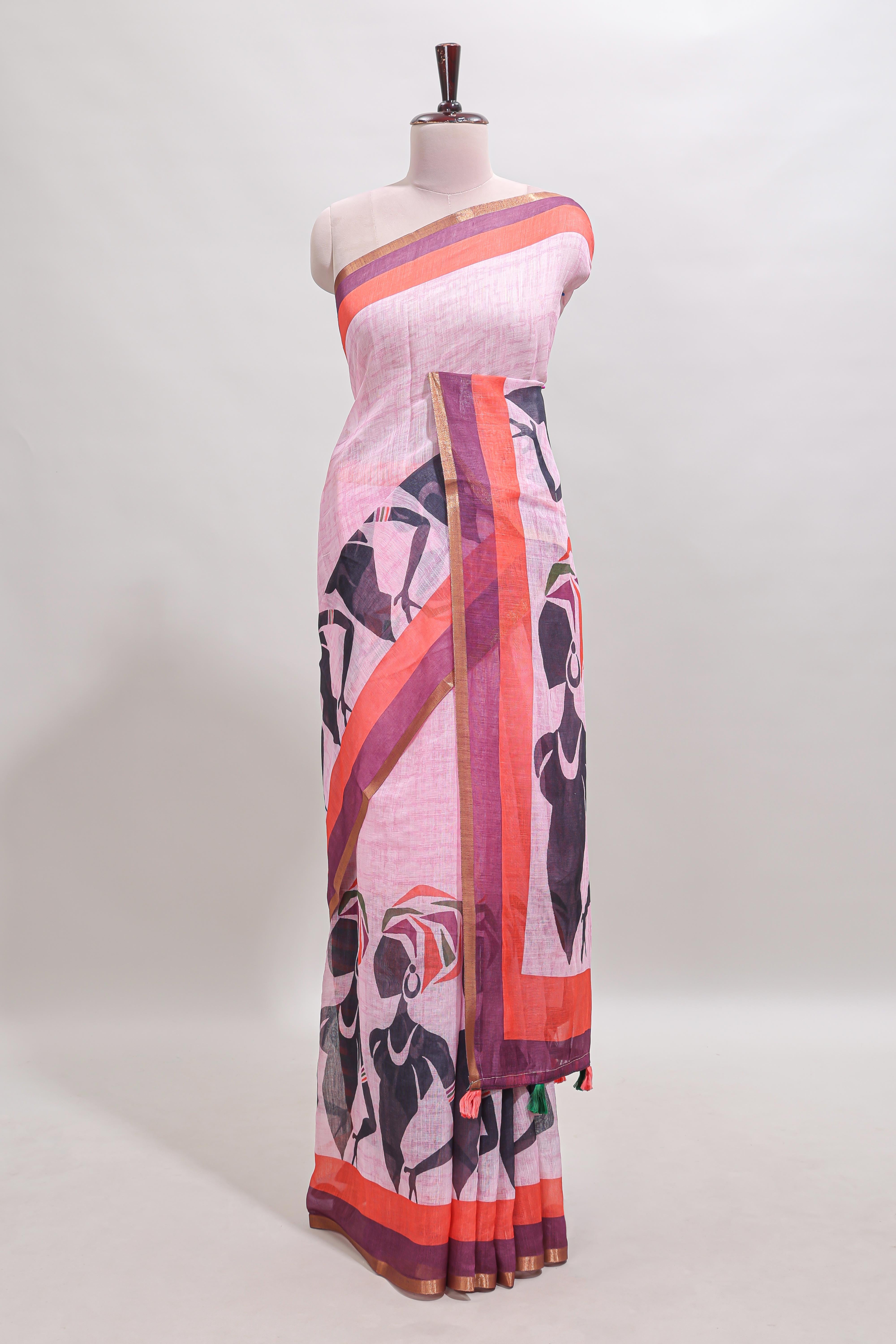 Light pink artistic traditional tribal print linen cotton saree with contrast border and striped blouse