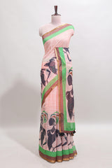 Light brown artistic traditional tribal print linen cotton saree with contrast border and striped blouse