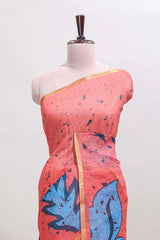 Orange floral design linen cotton saree with self zari border and contrast blouse