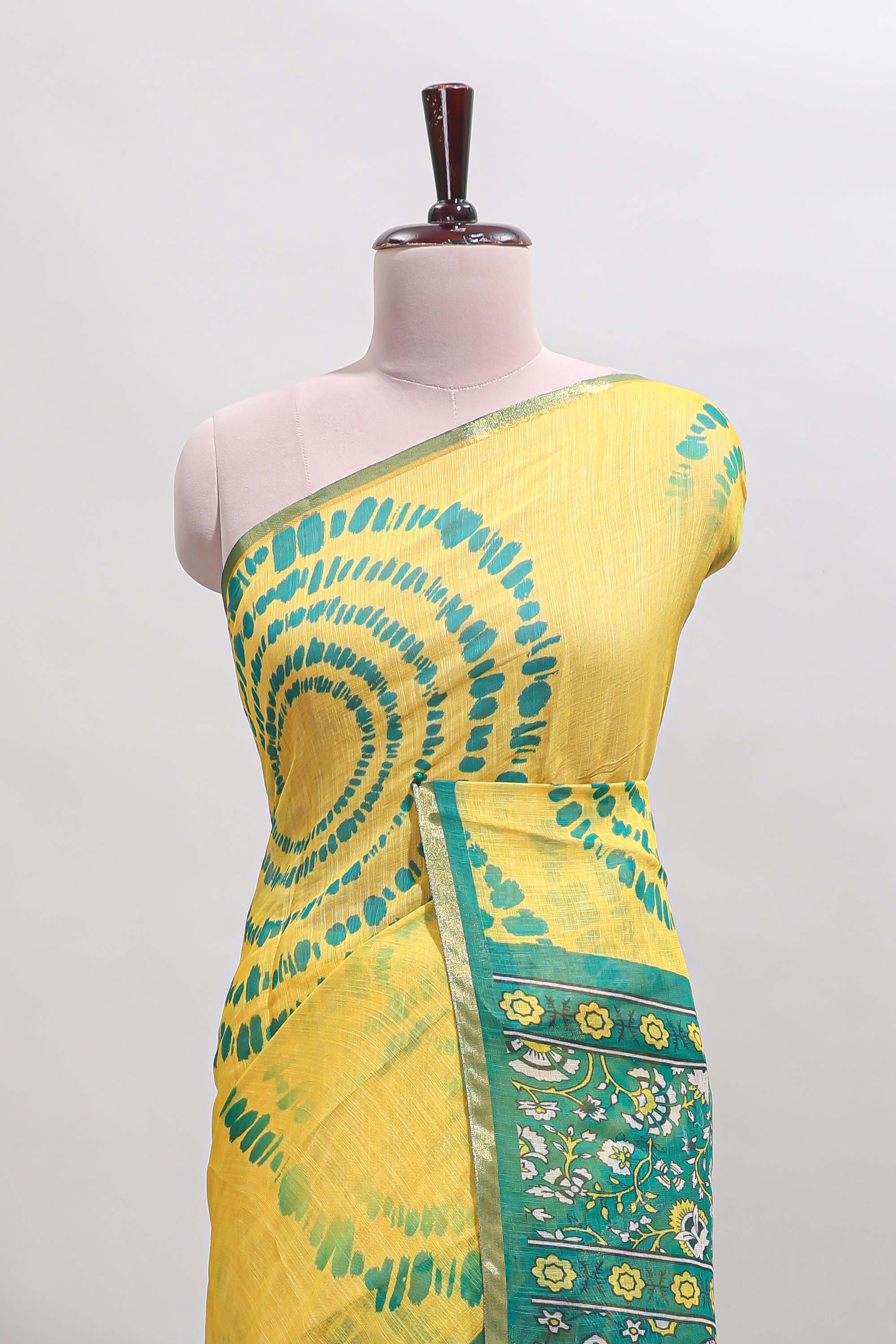 Yellow shibori design linen cotton saree with contrast zari border and printed blouse