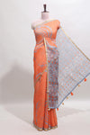 Orange shibori design linen cotton saree with contrast zari border and printed blouse