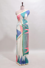 Cream ikkat style linen cotton saree with self zari border and contrast blouse