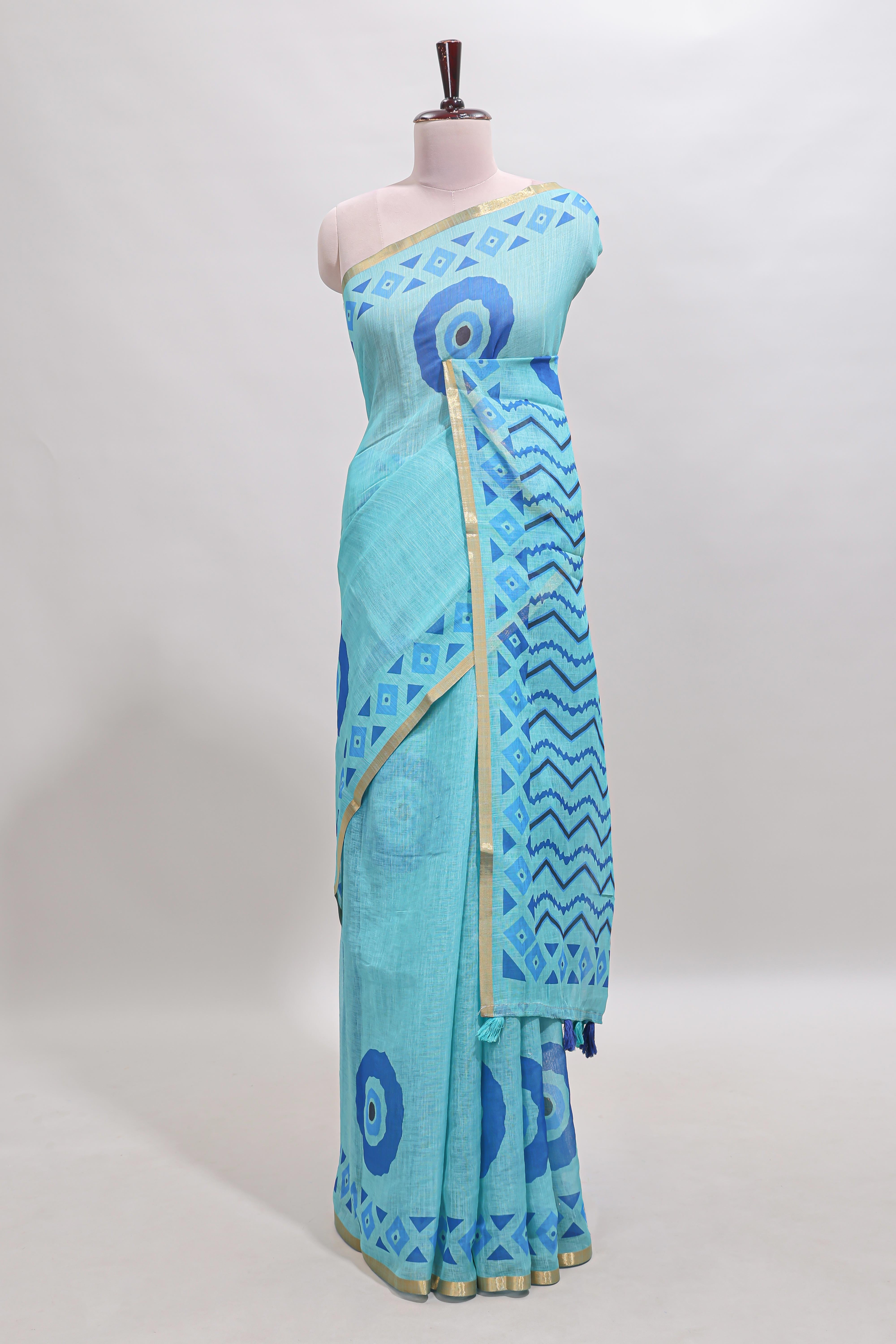 Turquiose green nazar print motifs design linen cotton saree with self zari border and contrast blouse