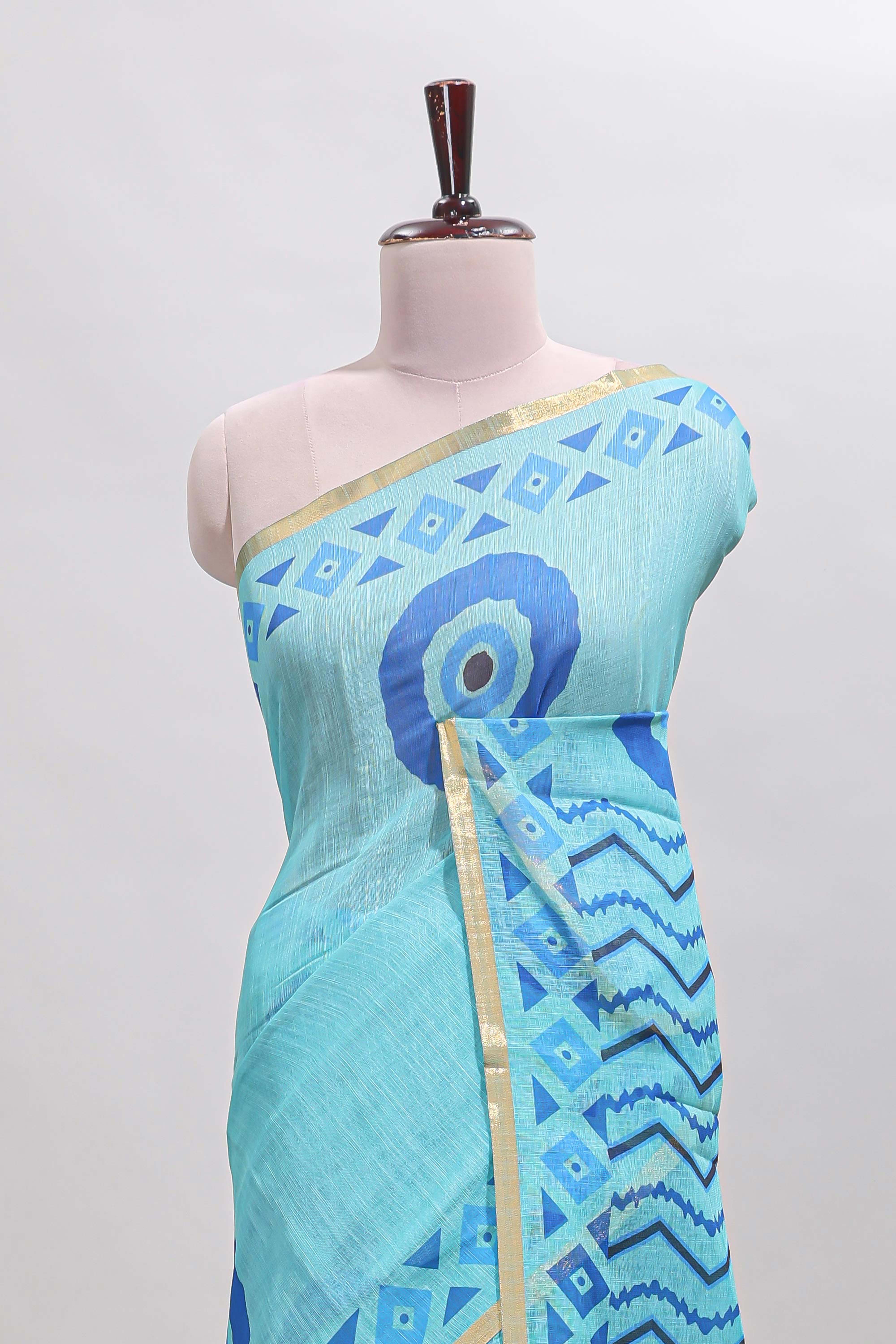Turquiose green nazar print motifs design linen cotton saree with self zari border and contrast blouse