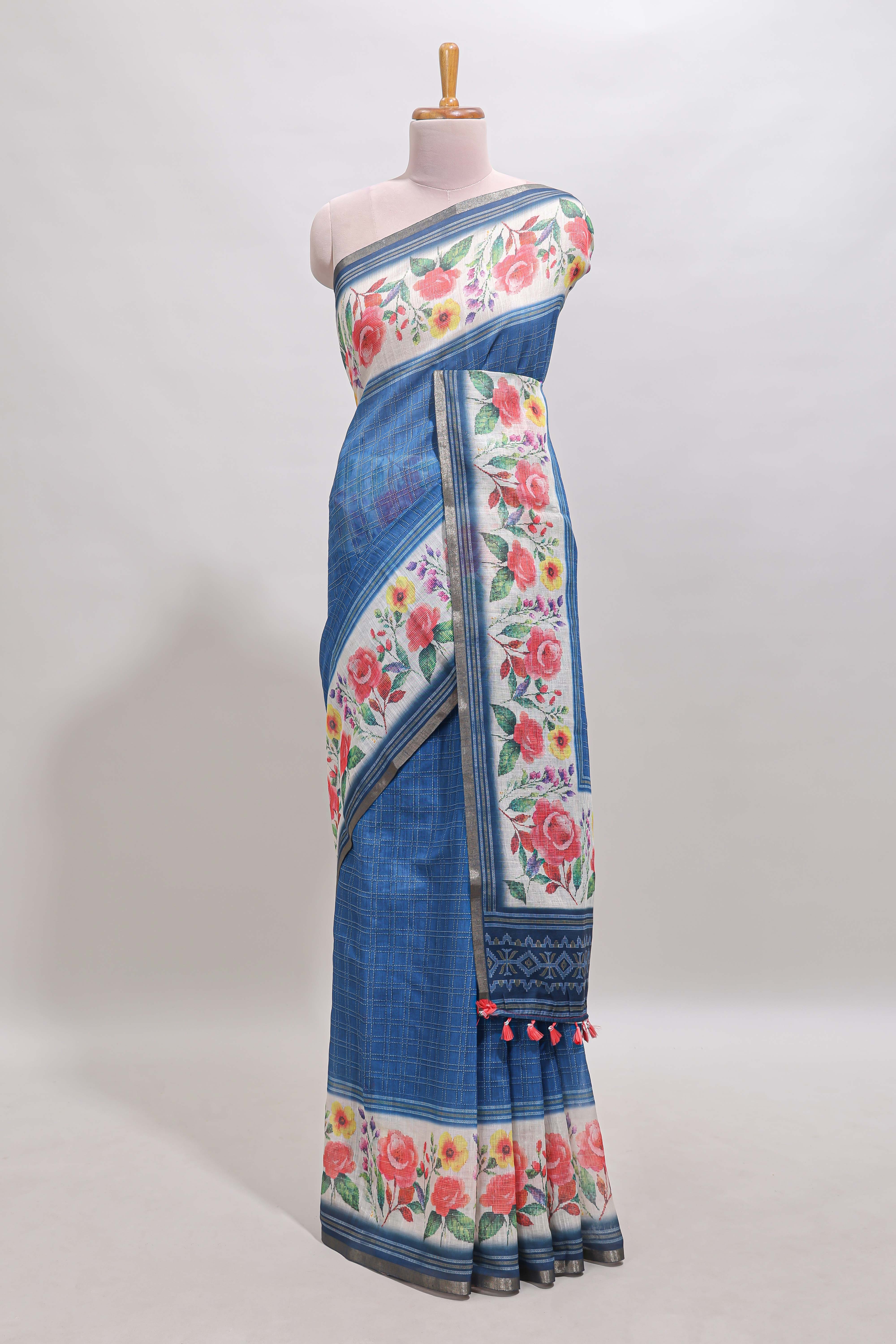 Blue checked bottom floral design linen cotton saree with self zari border and matching blouse