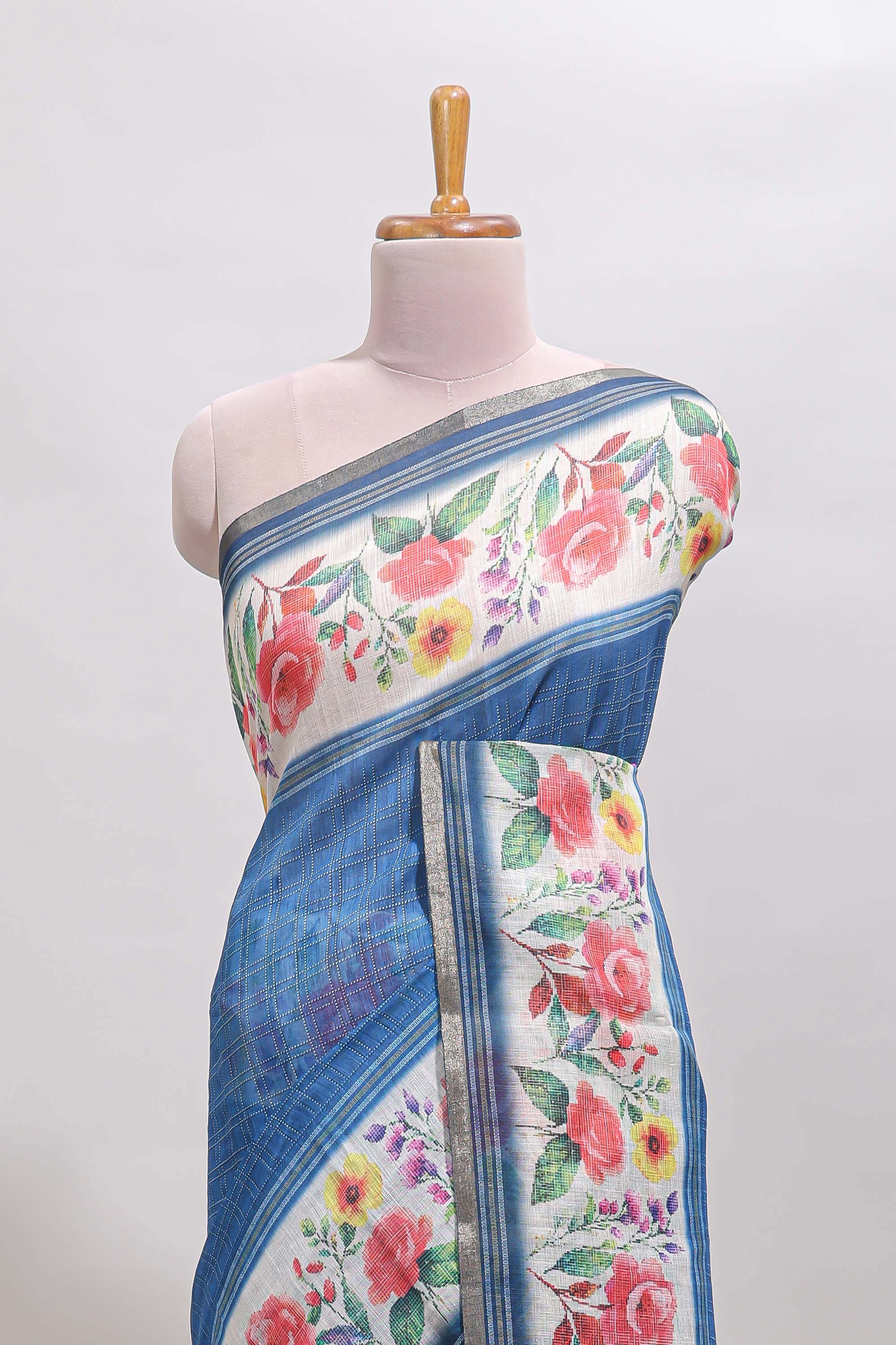 Blue checked bottom floral design linen cotton saree with self zari border and matching blouse