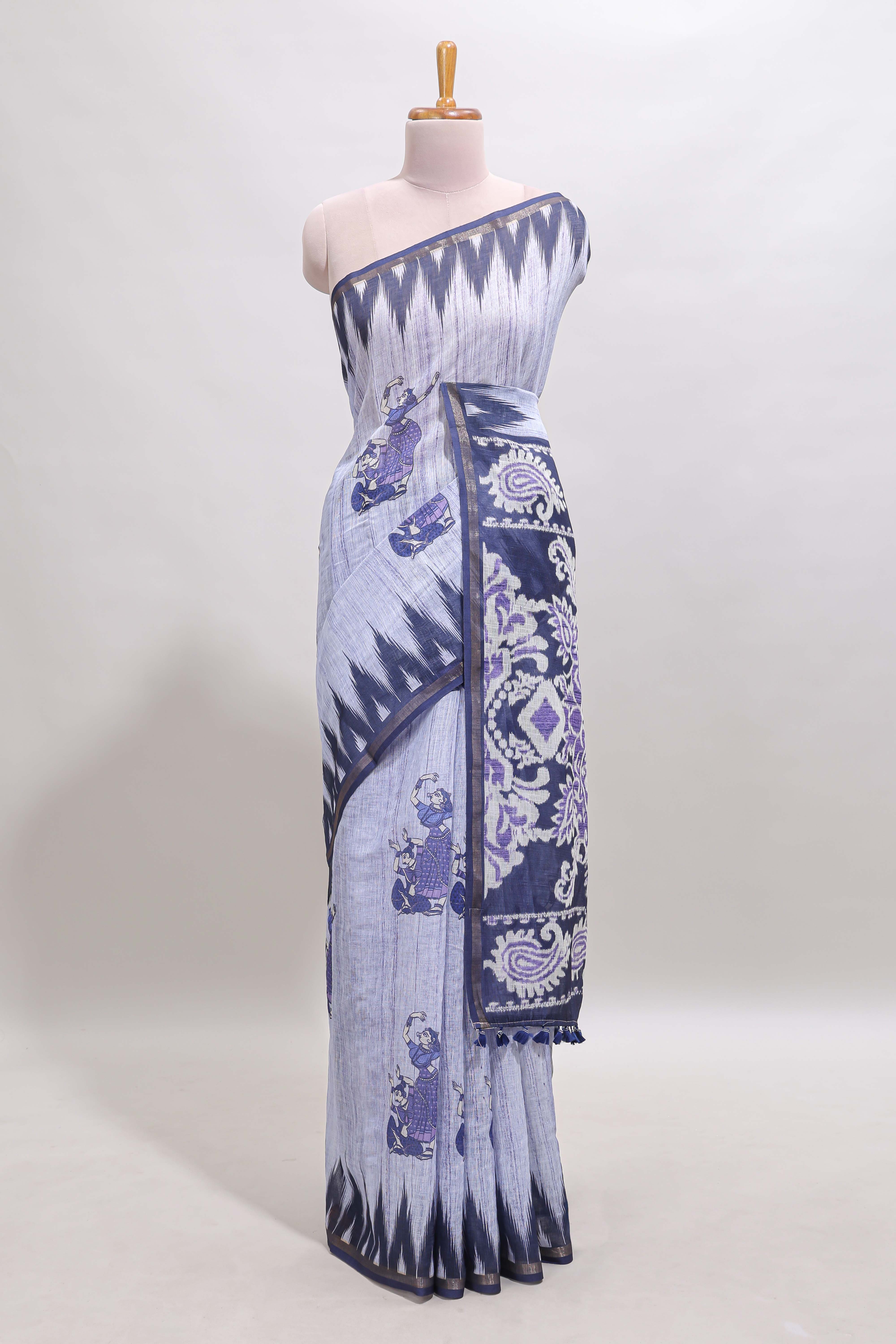 Lavender tribal dance dance motifs linen cotton saree with contrast ikkat border and printed pallu