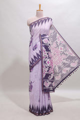 Purple tribal dance dance motifs linen cotton saree with contrast ikkat border and printed pallu