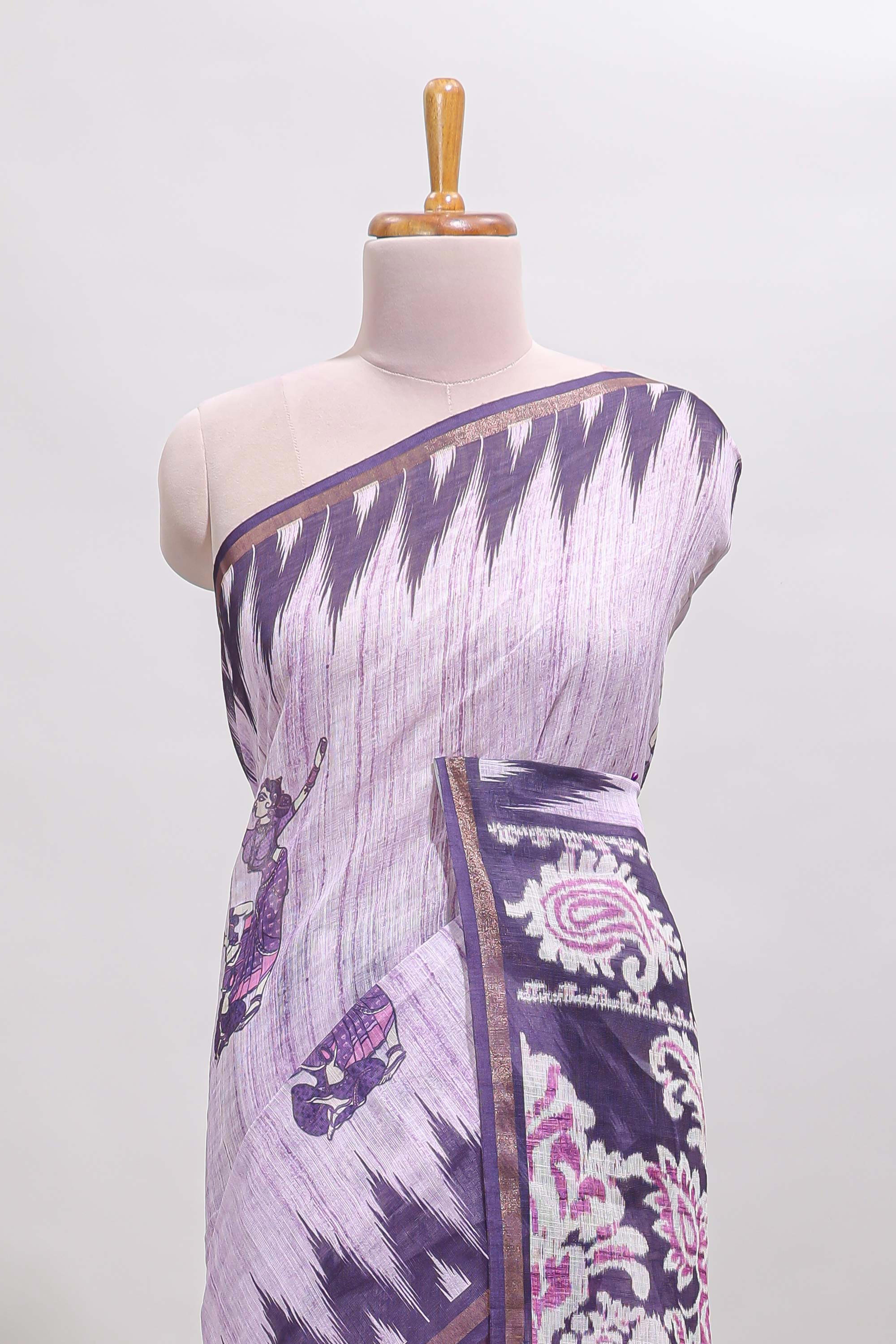 Purple tribal dance dance motifs linen cotton saree with contrast ikkat border and printed pallu