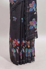 Black floral design linen cotton saree with scallop border and matching printed blouse