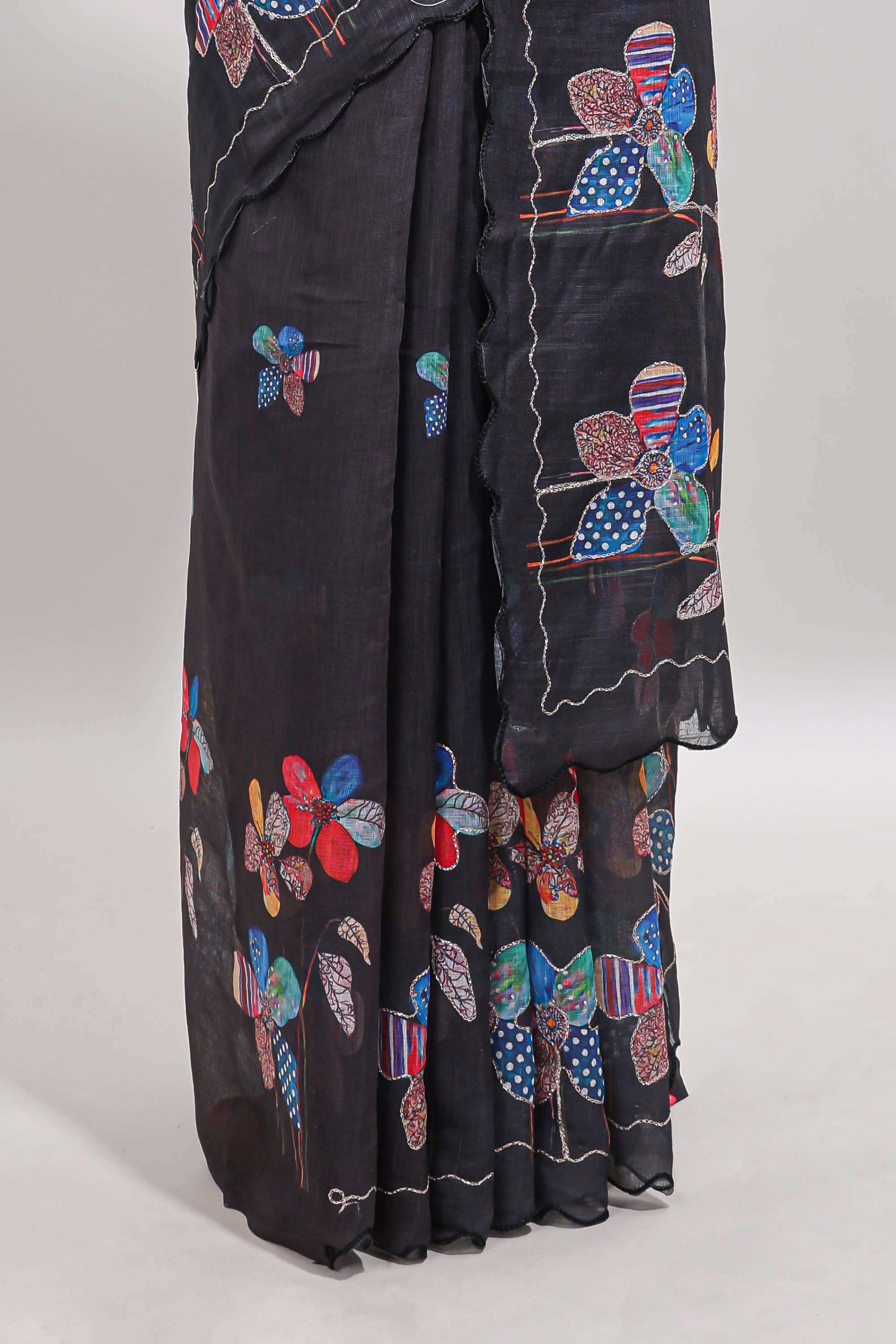 Black floral design linen cotton saree with scallop border and matching printed blouse
