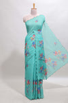 Green floral design linen cotton saree with scallop border and matching printed blouse