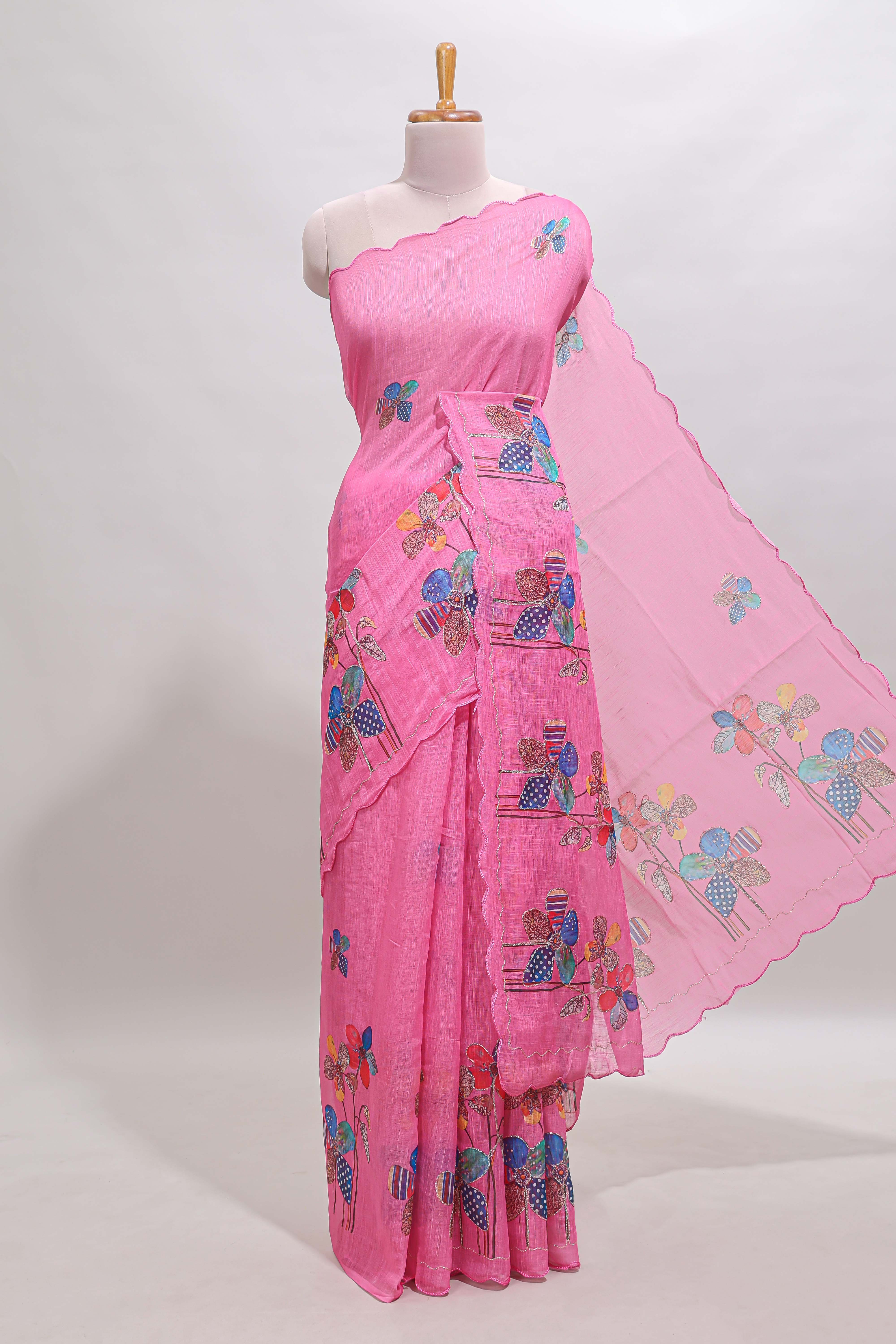 Pink floral design linen cotton saree with scallop border and matching printed blouse