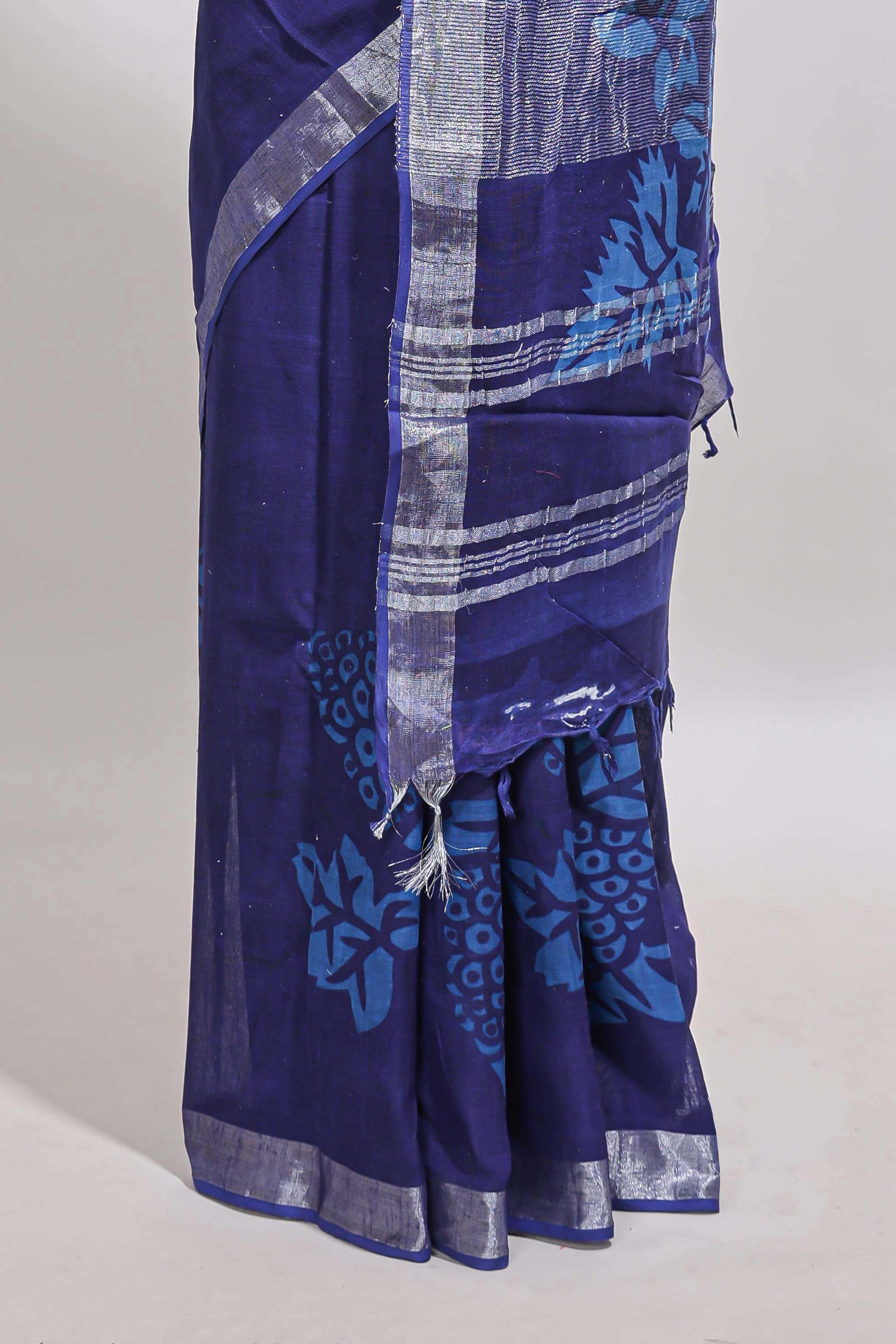 Blue floral design linen cotton saree with self zari border and matching plain blouse