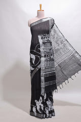 Black floral design linen cotton saree with self zari border and matching plain blouse