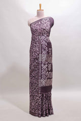 Dark purple floral design linen cotton saree with self zari border and matching blouse
