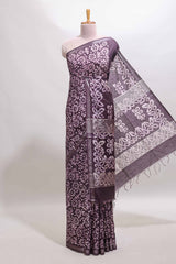Dark purple floral design linen cotton saree with self zari border and matching blouse