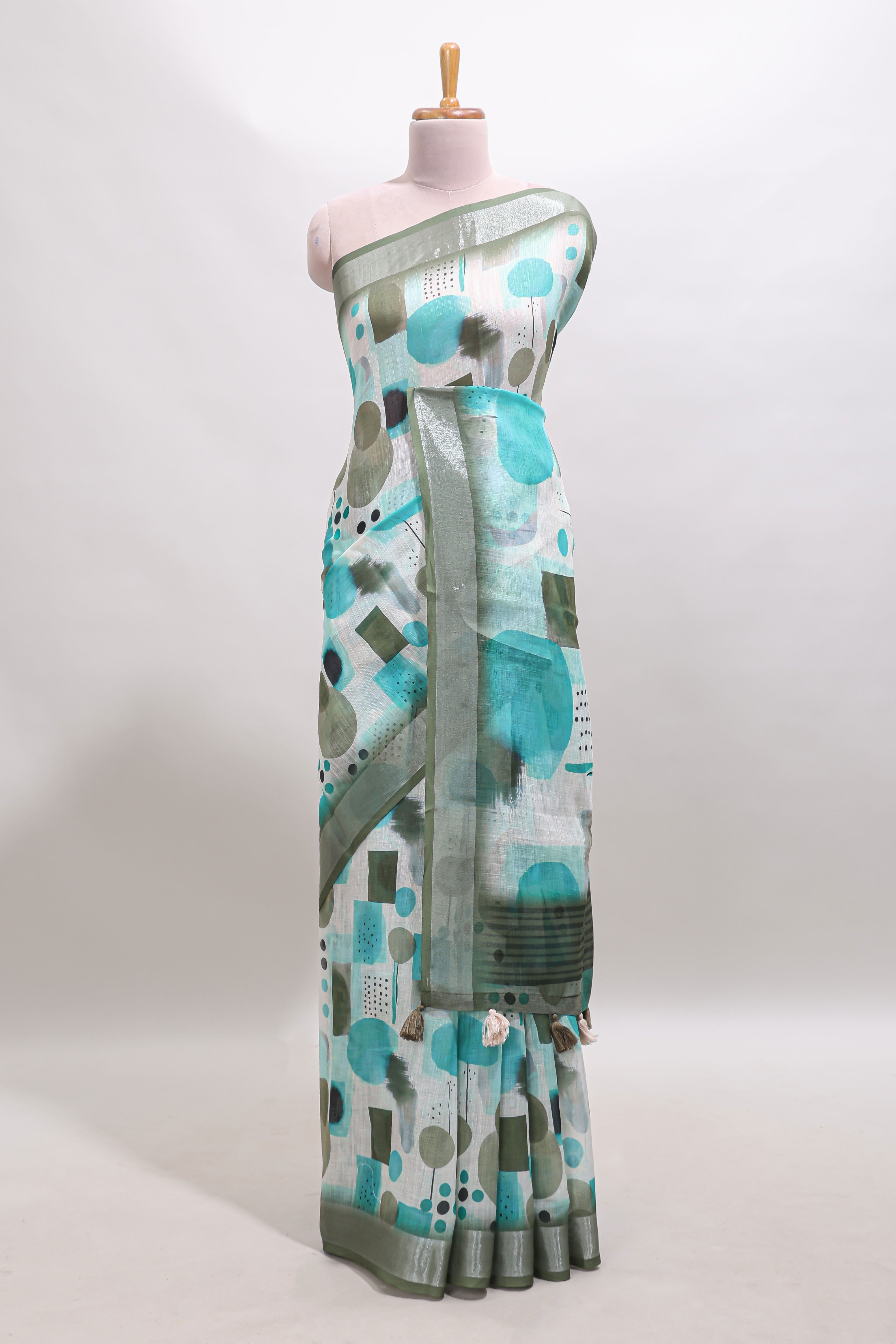 Multi color geometric design linen cotton saree with contrast zari border and matching blouse
