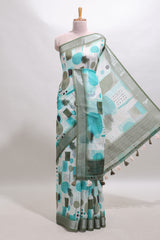 Multi color geometric design linen cotton saree with contrast zari border and matching blouse