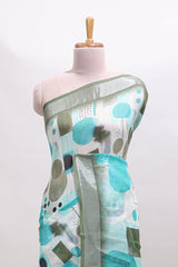 Multi color geometric design linen cotton saree with contrast zari border and matching blouse