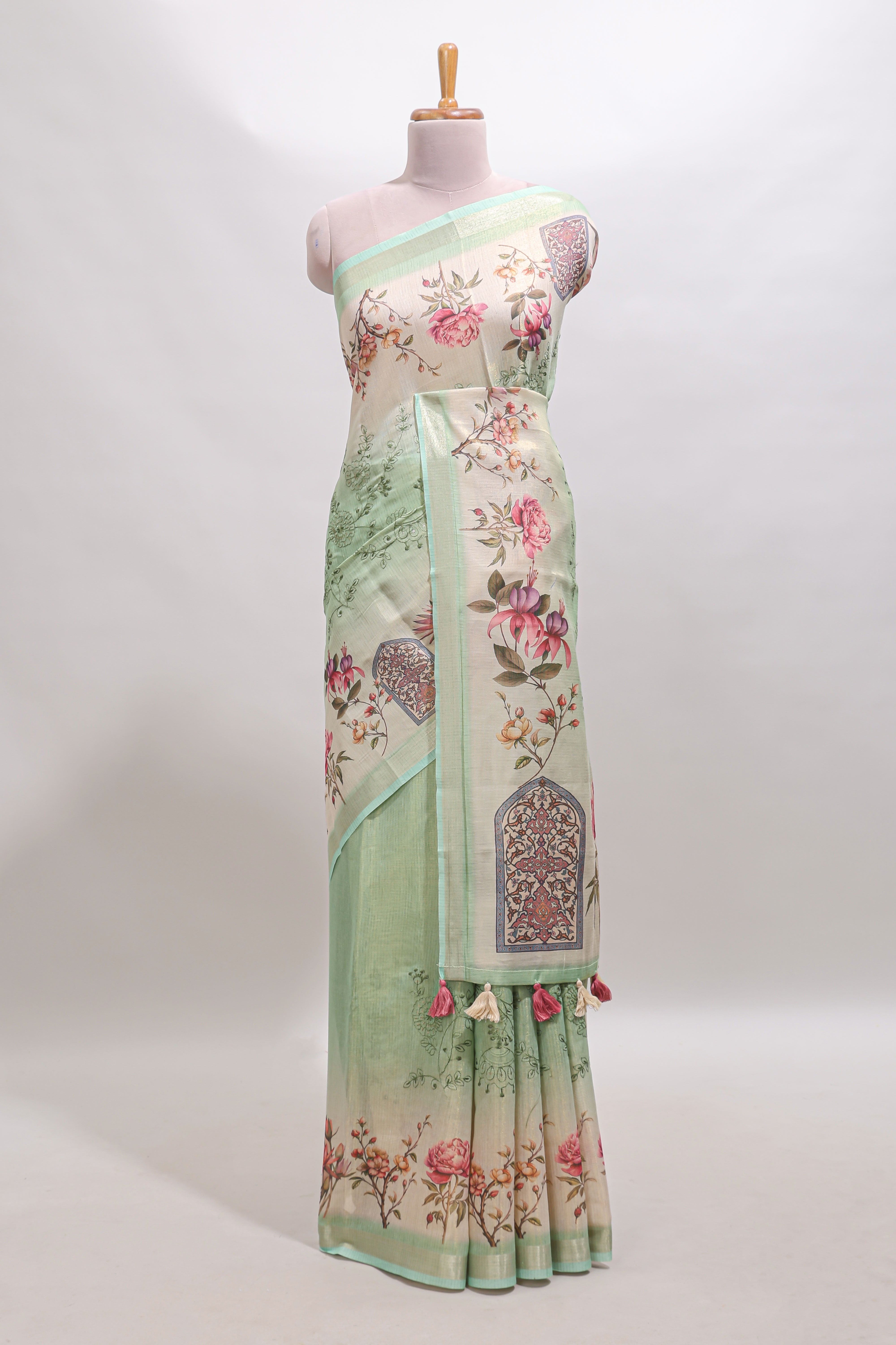Green floral design linen cotton saree with self zari border and matching printed blouse