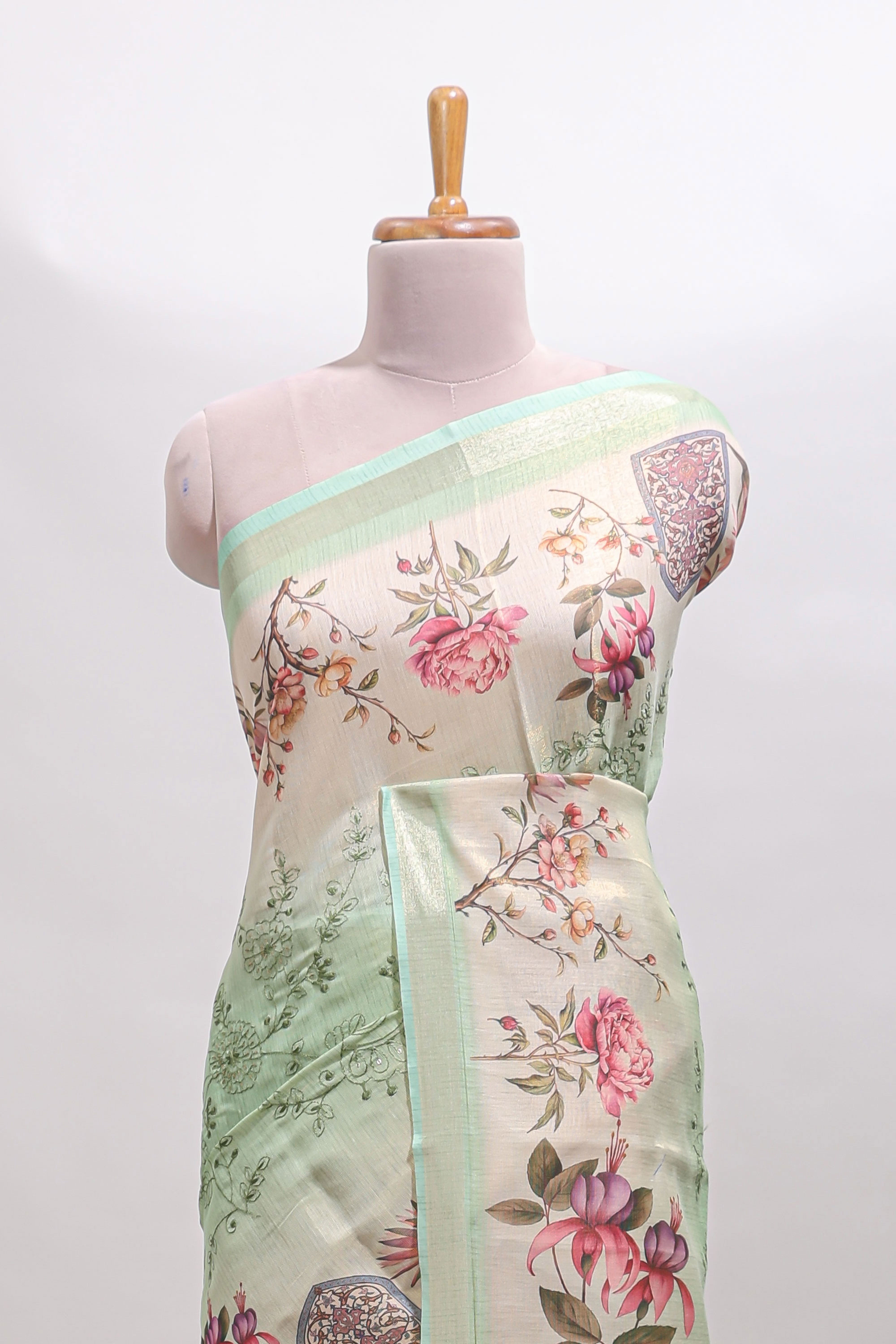 Green floral design linen cotton saree with self zari border and matching printed blouse